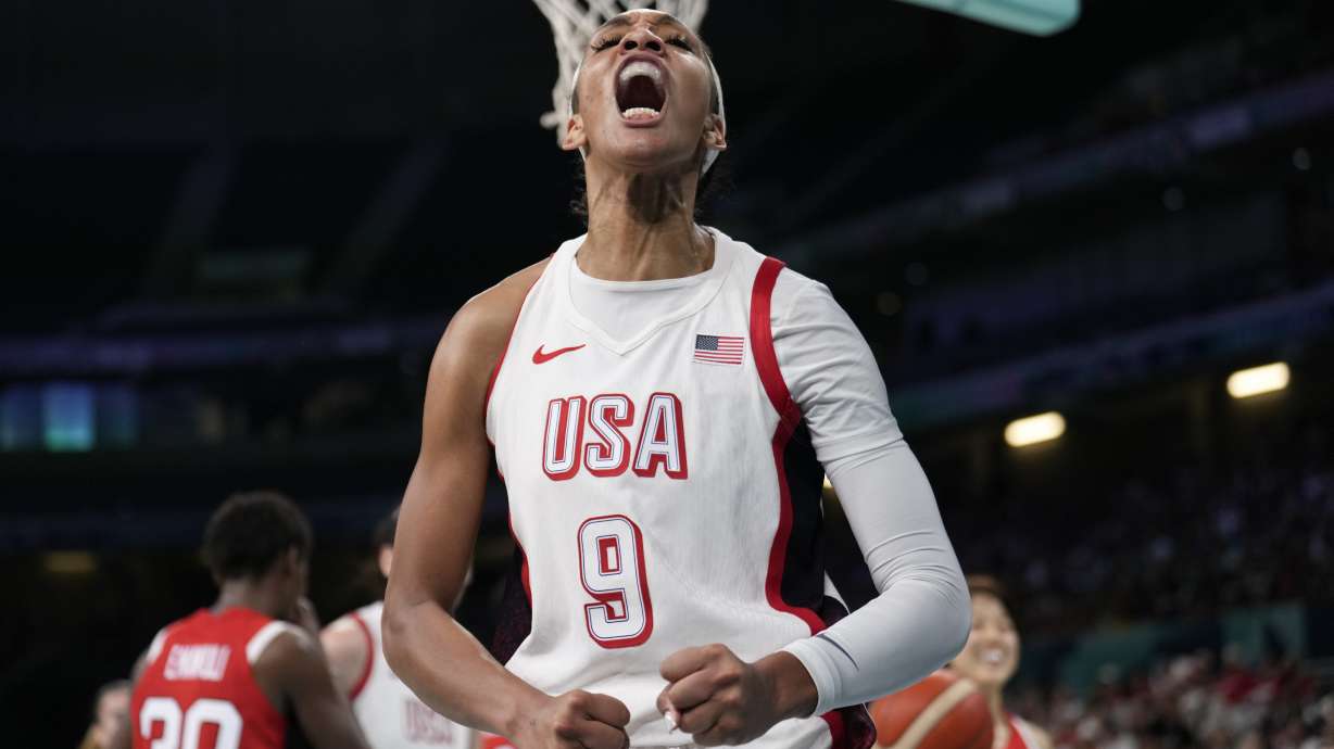 A'ja Wilson, of the Unites States, celebrates after scoring against Japan in a women's basketball game at the 2024 Summer Olympics, Monday, July 29, 2024, in Villeneuve-d'Ascq, France.