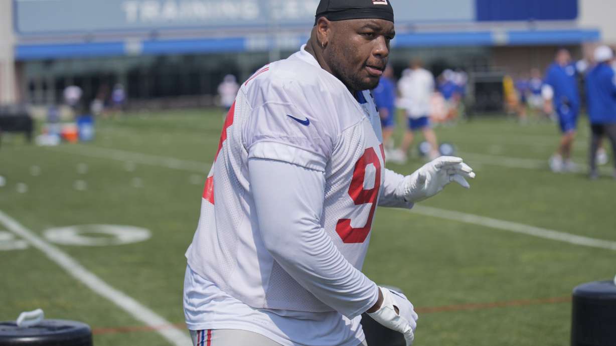 New York Giants' Dexter Lawrence II participates in a drill during the NFL football team's training camp in East Rutherford, N.J., Sunday, July 28, 2024.