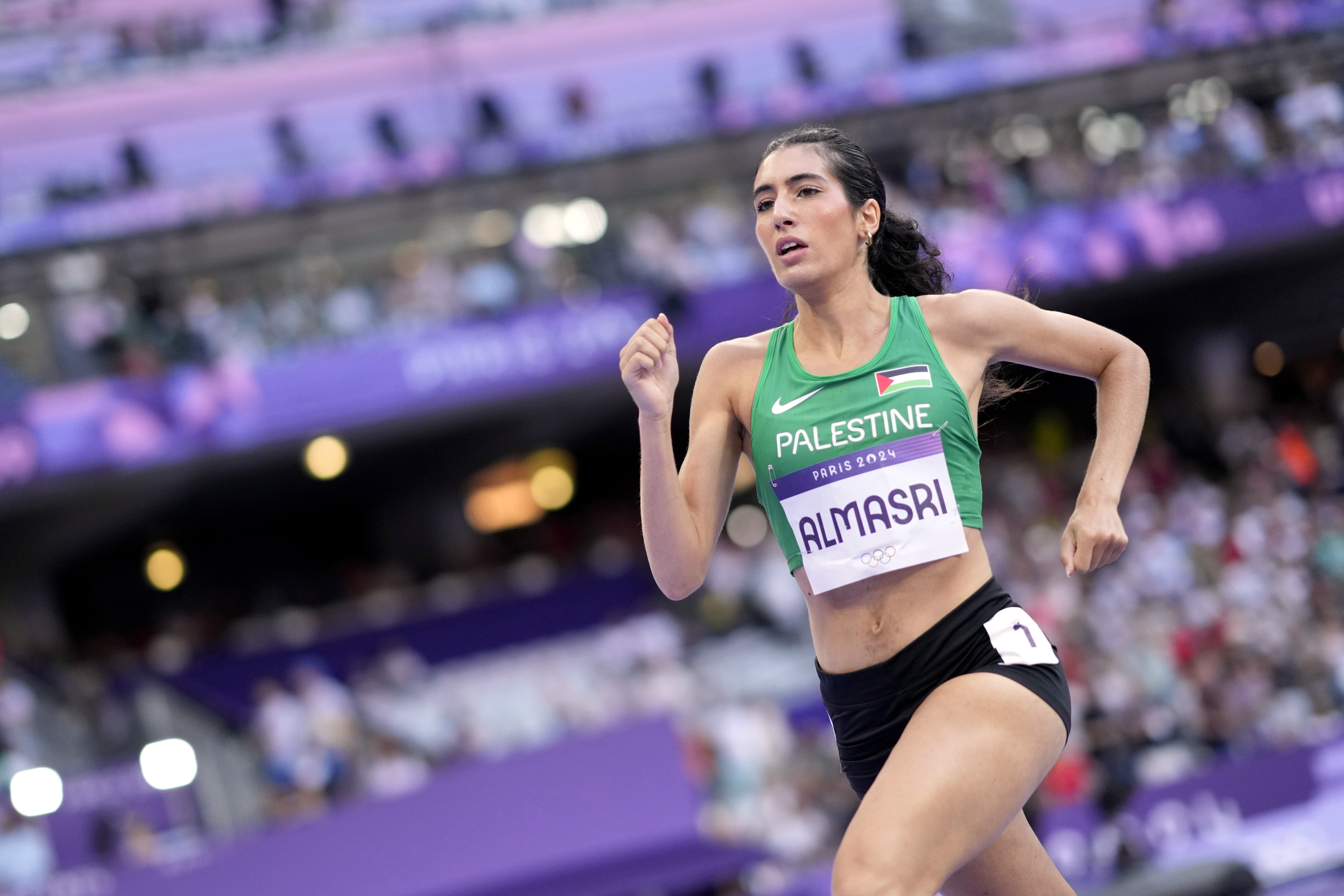 Layla Almasri, of Palestine, competes in a women's 800 meters round 1 heat at the 2024 Summer Olympics, Friday, Aug. 2, 2024, in Saint-Denis, France.
