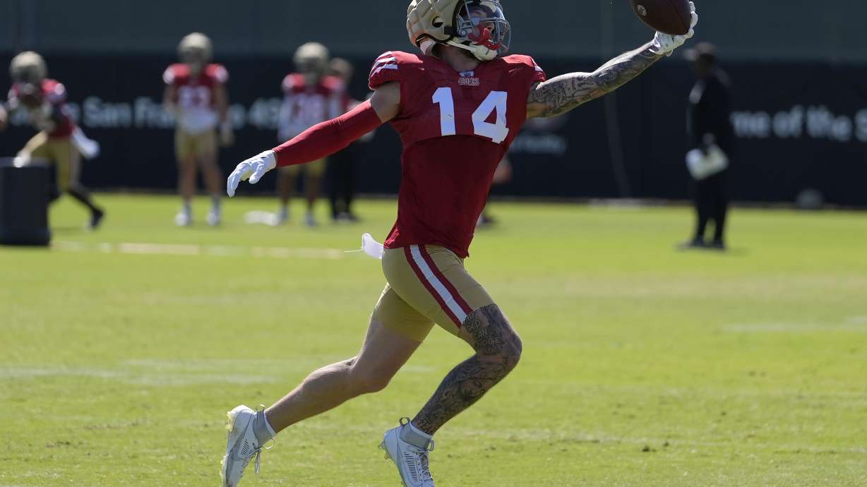 San Francisco 49ers wide receiver Ricky Pearsall catches a pass during NFL football training camp in Santa Clara, Calif., Wednesday, July 31, 2024.