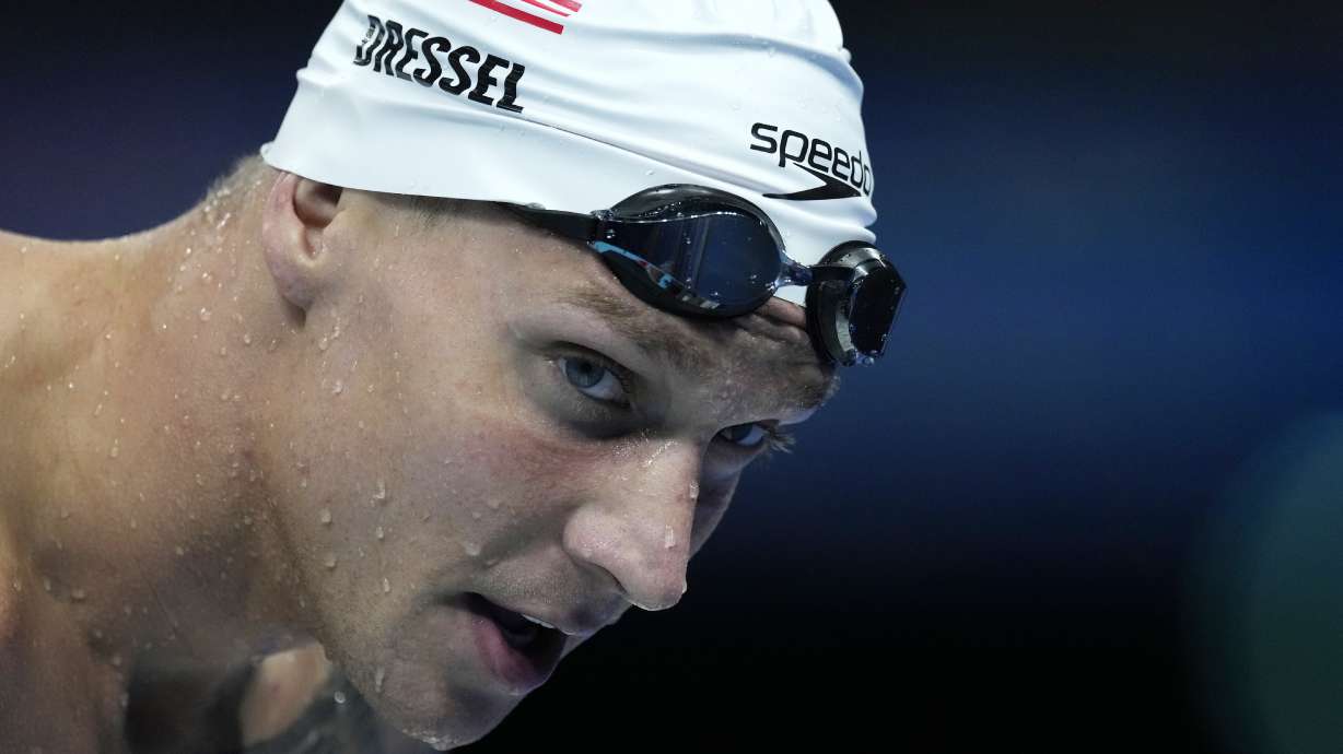 Caeleb Dressel of United States, warms up ahead of the men's 50-meter freestyle final at the 2024 Summer Olympics, Friday, Aug. 2, 2024, in Nanterre, France.