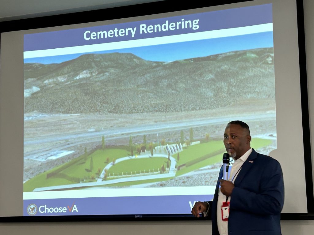 Roderick Thomas director of the VA’s Fort Logan National Cemetery Complex, talks about architectural rendering of the Southern Utah National Cemetery, Cedar City, July 16.