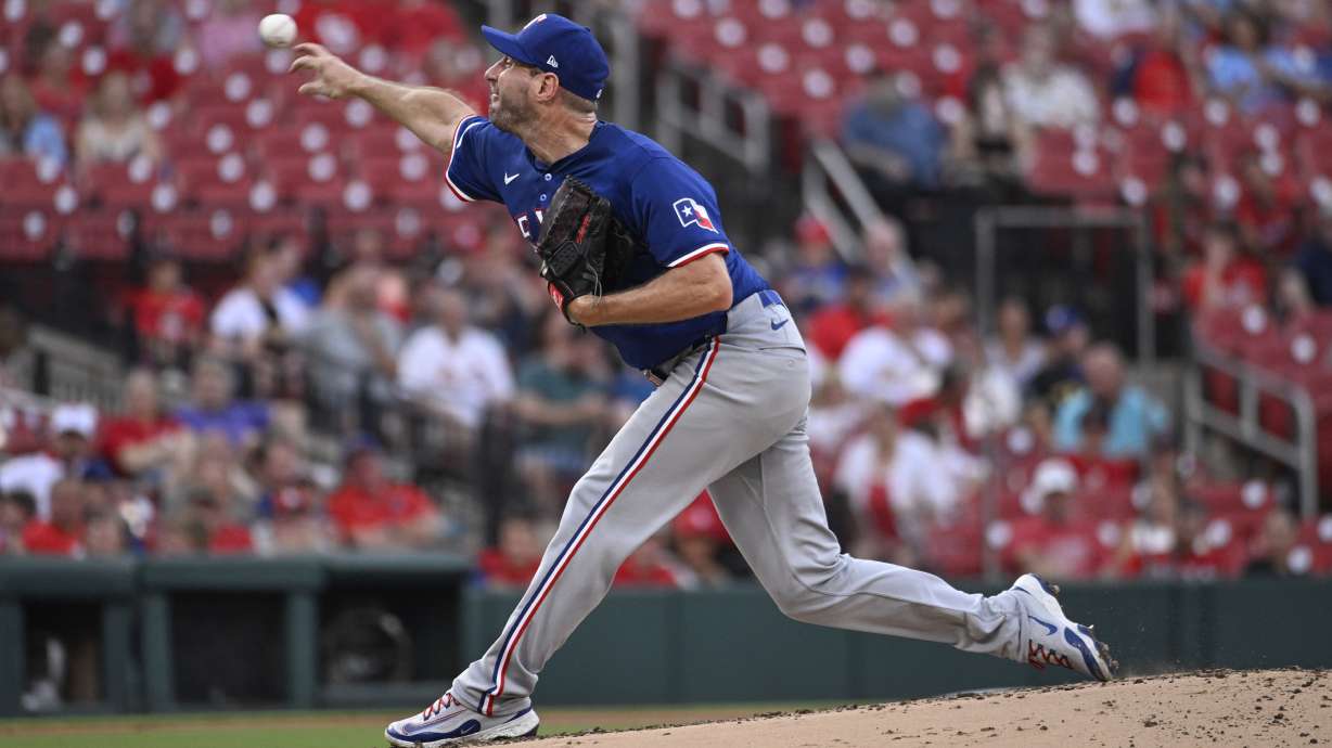 Texas Rangers starting pitcher Max Scherzer throws in the first inning of a baseball game against the St. Louis Cardinals, Tuesday, July 30, 2024, in St. Louis.