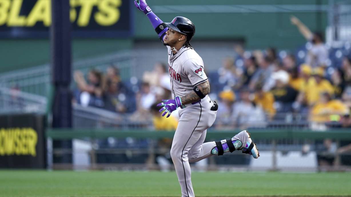 Arizona Diamondbacks' Ketel Marte rounds the bases after hitting a home run during the first inning of a baseball game against the Pittsburgh Pirates, Friday, Aug. 2, 2024, in Pittsburgh.