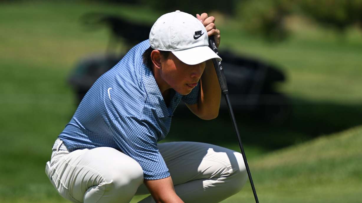 Kihei Akina sets his ball in place as he and other golfers compete in the 2024 Utah Championship in Farmington on Friday, Aug. 2, 2024.