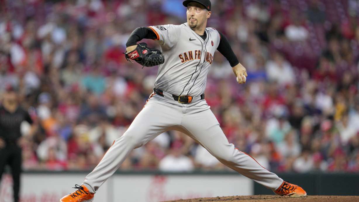 San Francisco Giants pitcher Blake Snell throws during the second inning of a baseball game against the Cincinnati Reds, Friday, Aug. 2, 2024, in Cincinnati.
