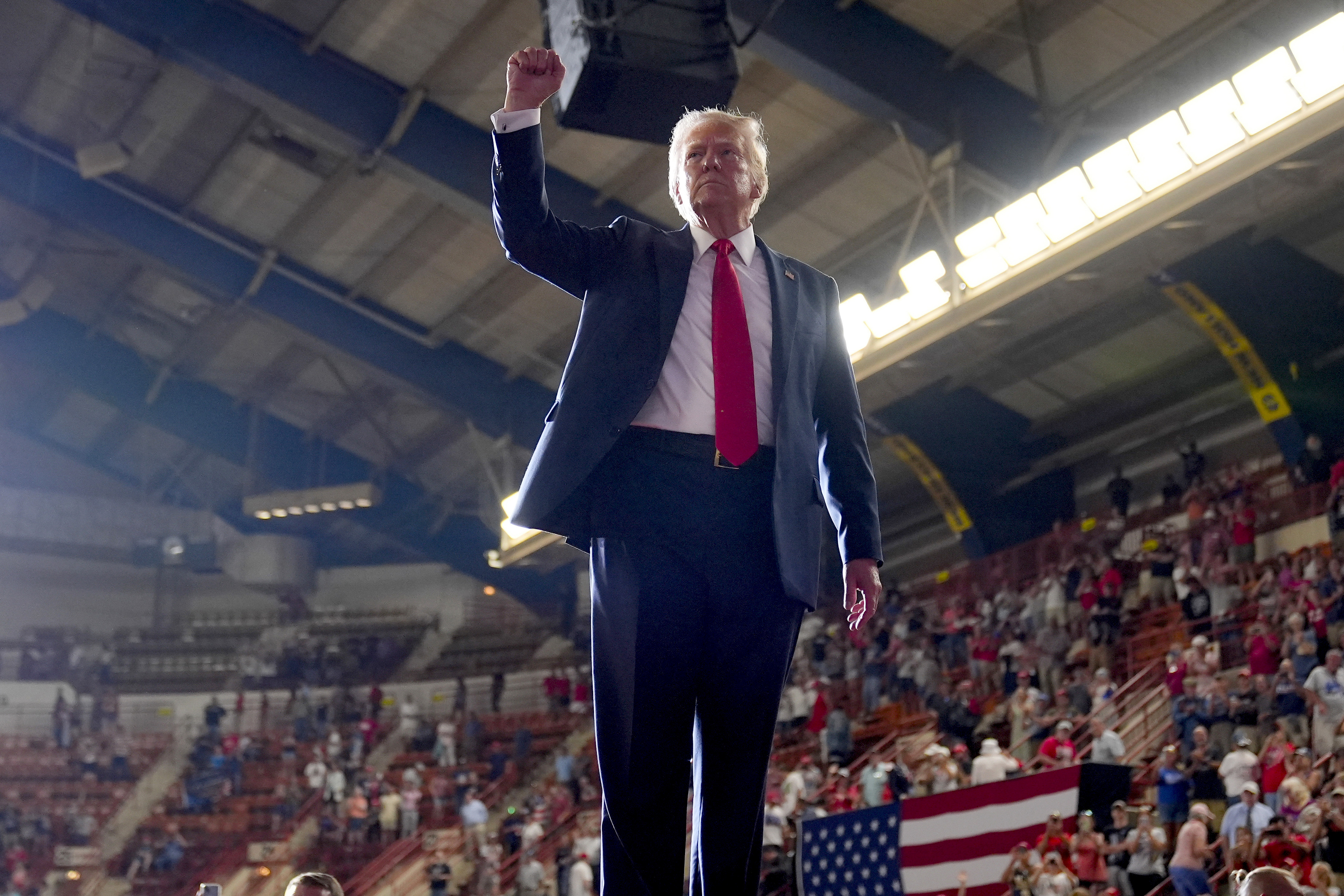 Former President Donald Trump gestures to the crowd after speaking at a campaign rally Wednesday in Harrisburg, Pa. Trump returns to Georgia on Saturday, a state that both major parties now see as up for grabs, yet again. 