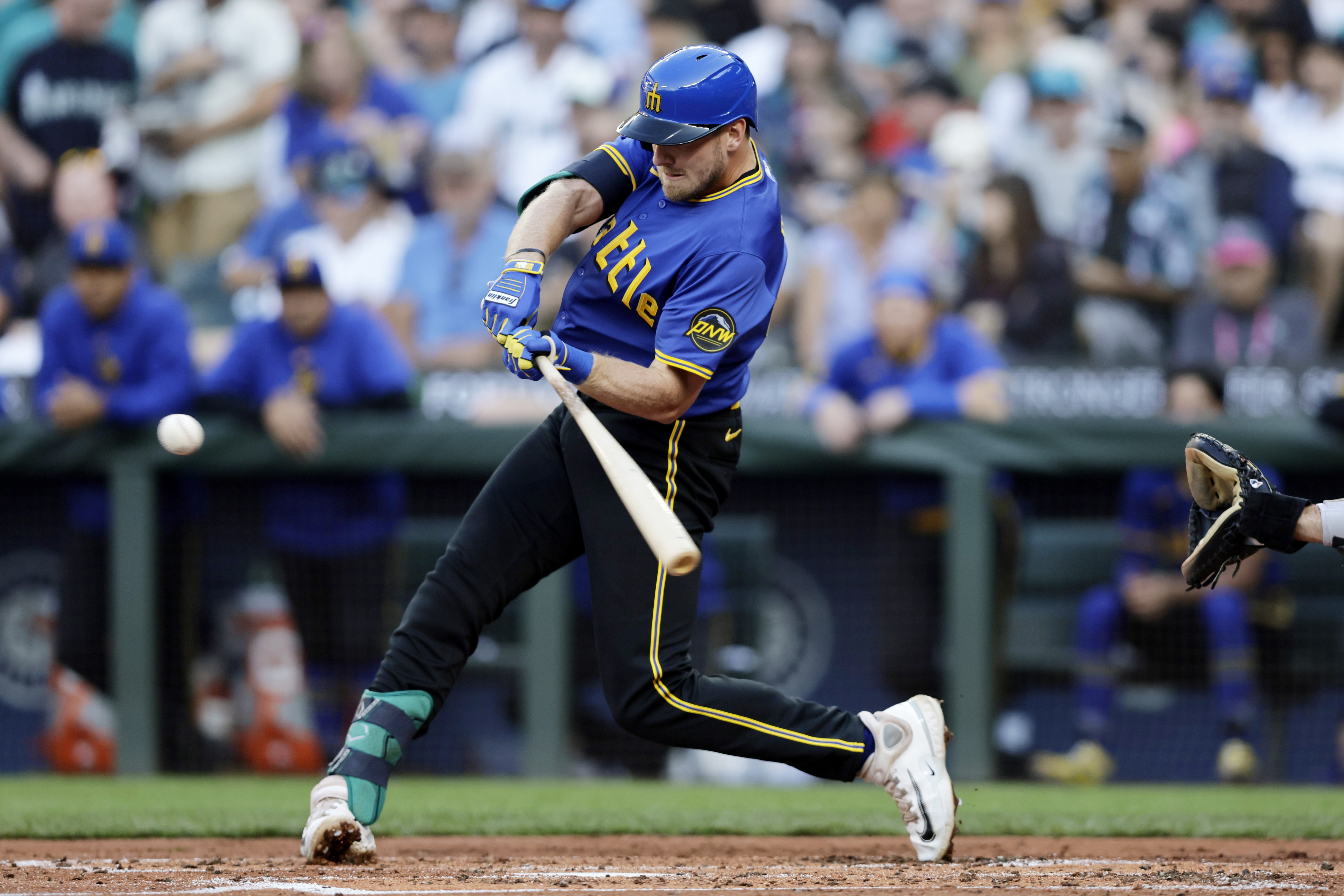 Seattle Mariners' Luke Raley hits a three-run home run off Philadelphia Phillies starting pitcher Tyler Phillips during the second inning in a baseball game, Friday, Aug. 2, 2024, in Seattle. 