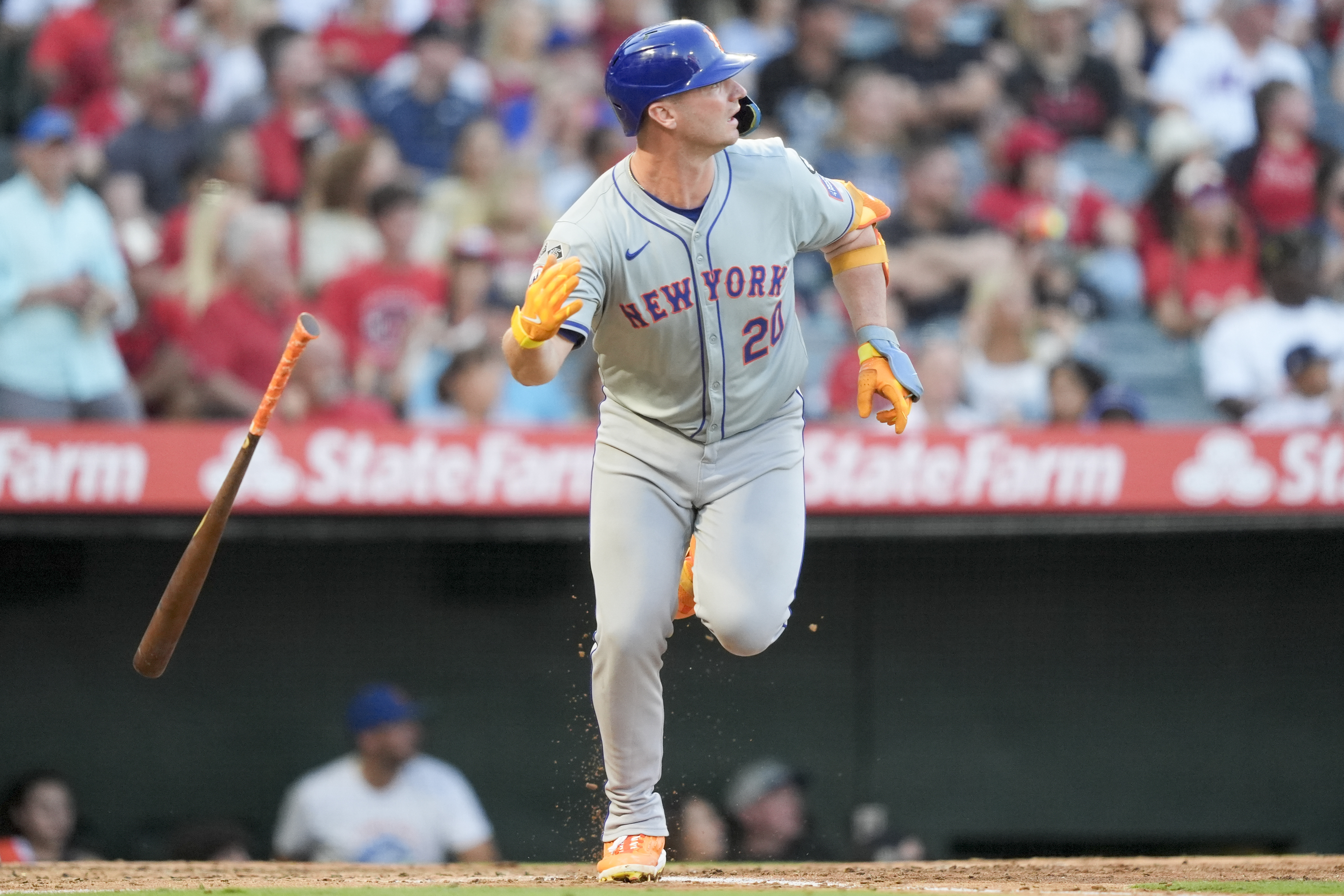 New York Mets' Pete Alonso tosses his bat after hitting a two-run home run during the third inning of a baseball game against the Los Angeles Angels, Friday, Aug. 2, 2024, in Anaheim, Calif. 