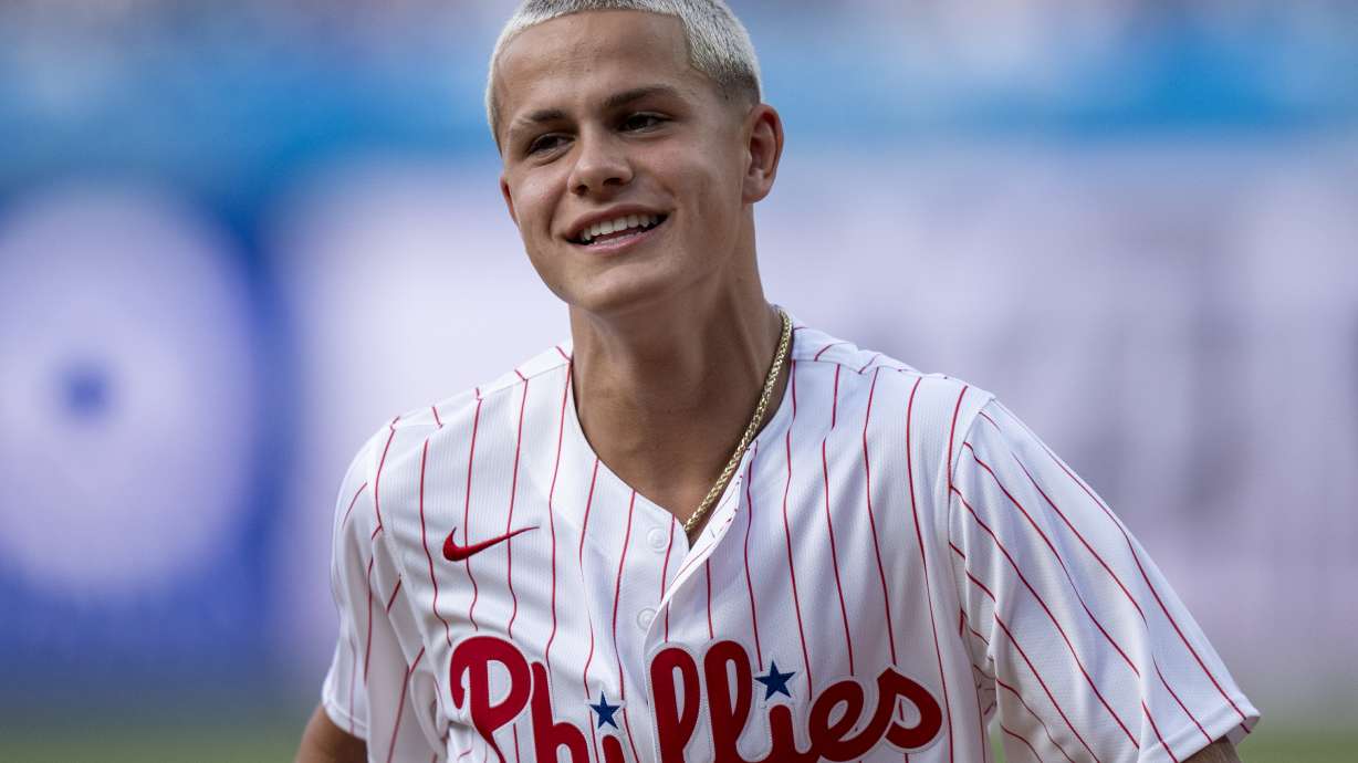 Philadelphia Union's Cavan Sullivan looks on after throwing of the ceremonial first pitch before the first inning of a baseball game between the New York Yankees and the Philadelphia Phillies, Tuesday, July 30, 2024, in Philadelphia.