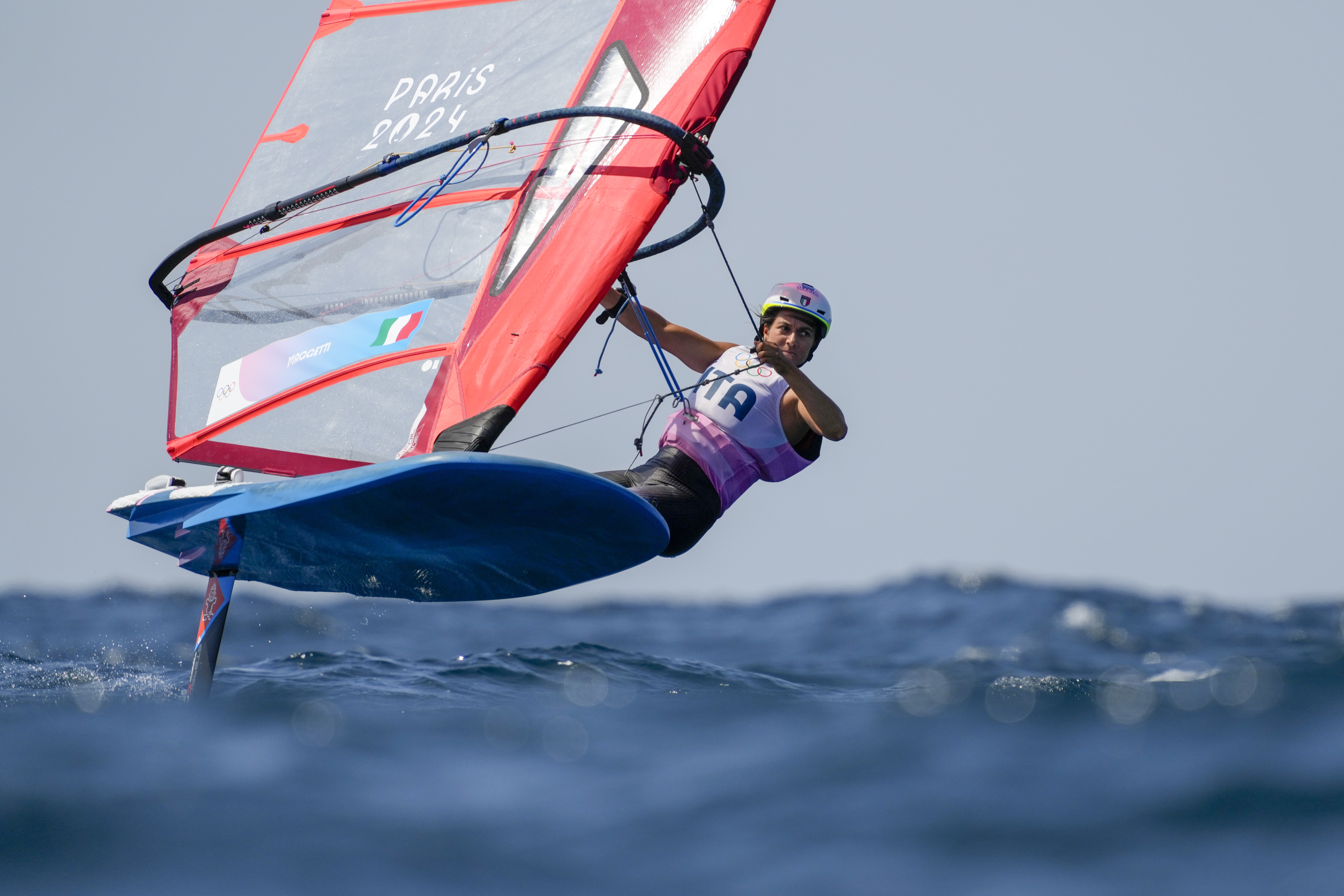 Marta Maggetti, of Italy, warms up before a women's iQFOiL windsurfing class during the 2024 Summer Olympics, Saturday, Aug. 3, 2024, in Marseille, France. 