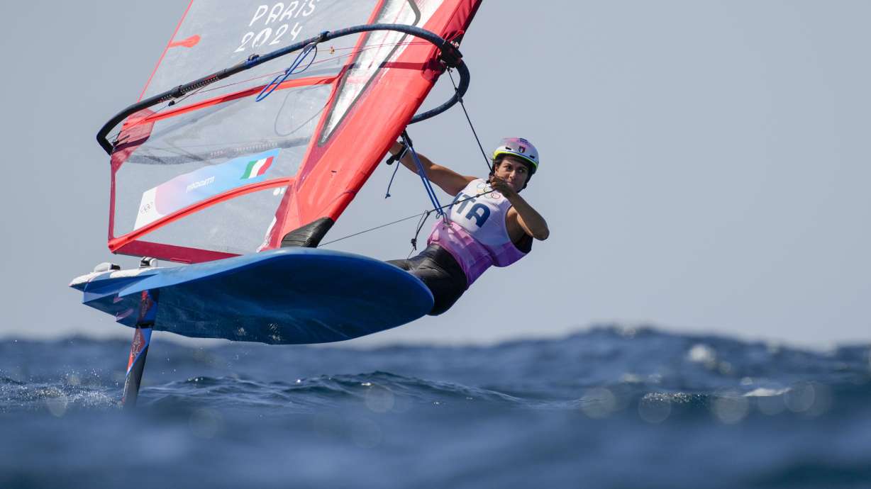 Marta Maggetti, of Italy, warms up before a women's iQFOiL windsurfing class during the 2024 Summer Olympics, Saturday, Aug. 3, 2024, in Marseille, France.