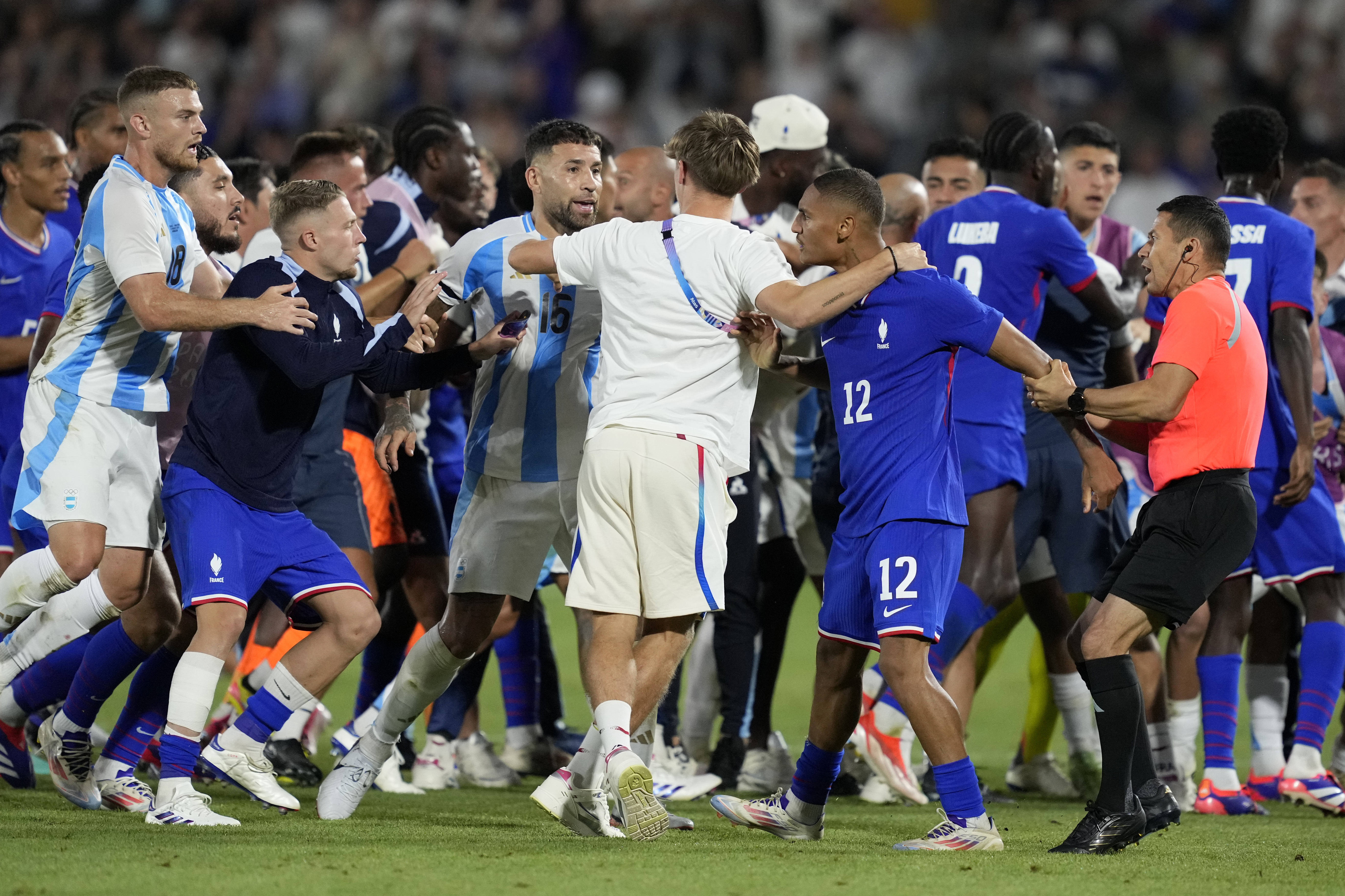 France and Argentina players argue at the end of a quarter final soccer match between France and Argentina, at Bordeaux Stadium, during the 2024 Summer Olympics, Friday, Aug. 2, 2024, in Bordeaux, France.