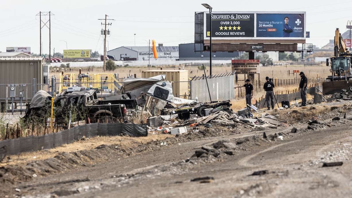Police investigate a crash on state Route 36 following the pursuit of a shooting suspect in Tooele County on Saturday.
