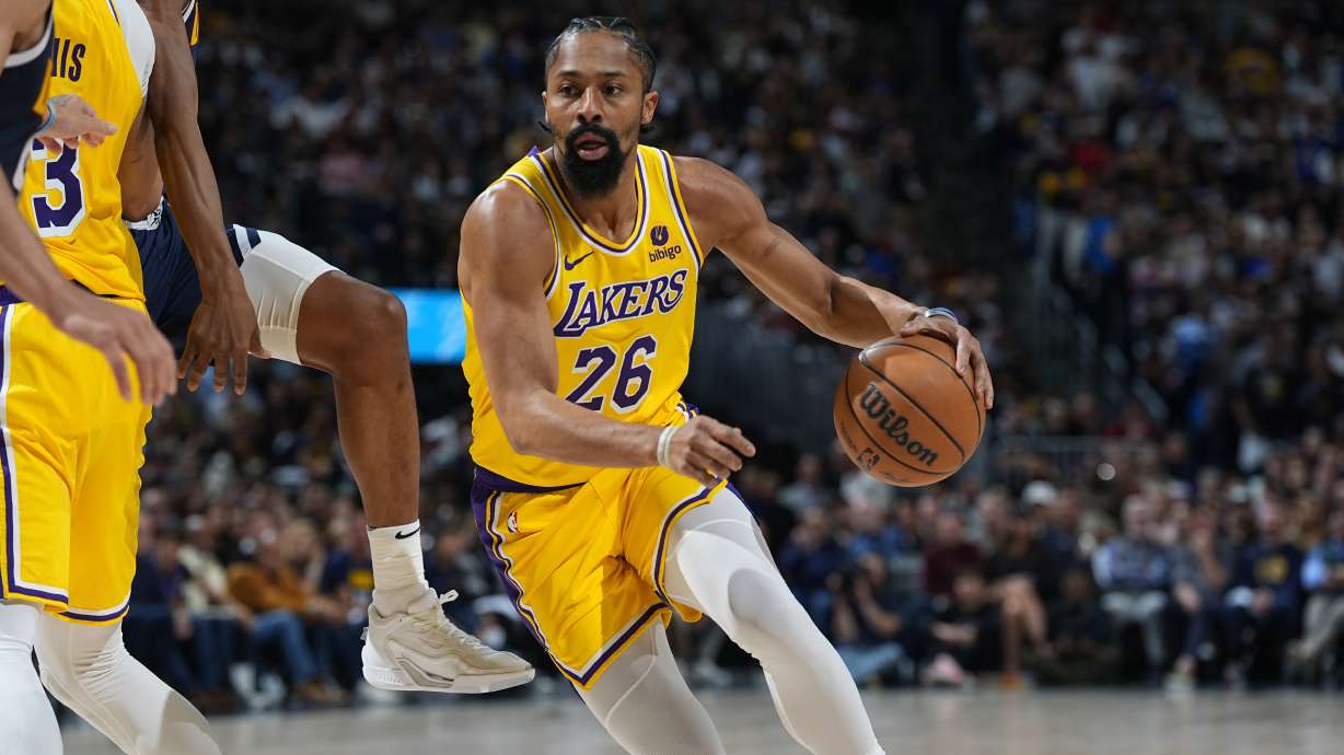 FILE - Los Angeles Lakers guard Spencer Dinwiddie (26) in the second half of Game 5 of an NBA basketball first-round playoff series Monday, April 29, 2024, in Denver. The Dallas Mavericks are bringing back Spencer Dinwiddie in a reunion with the guard who played a key role in the club's run to the 2022 Western Conference finals.