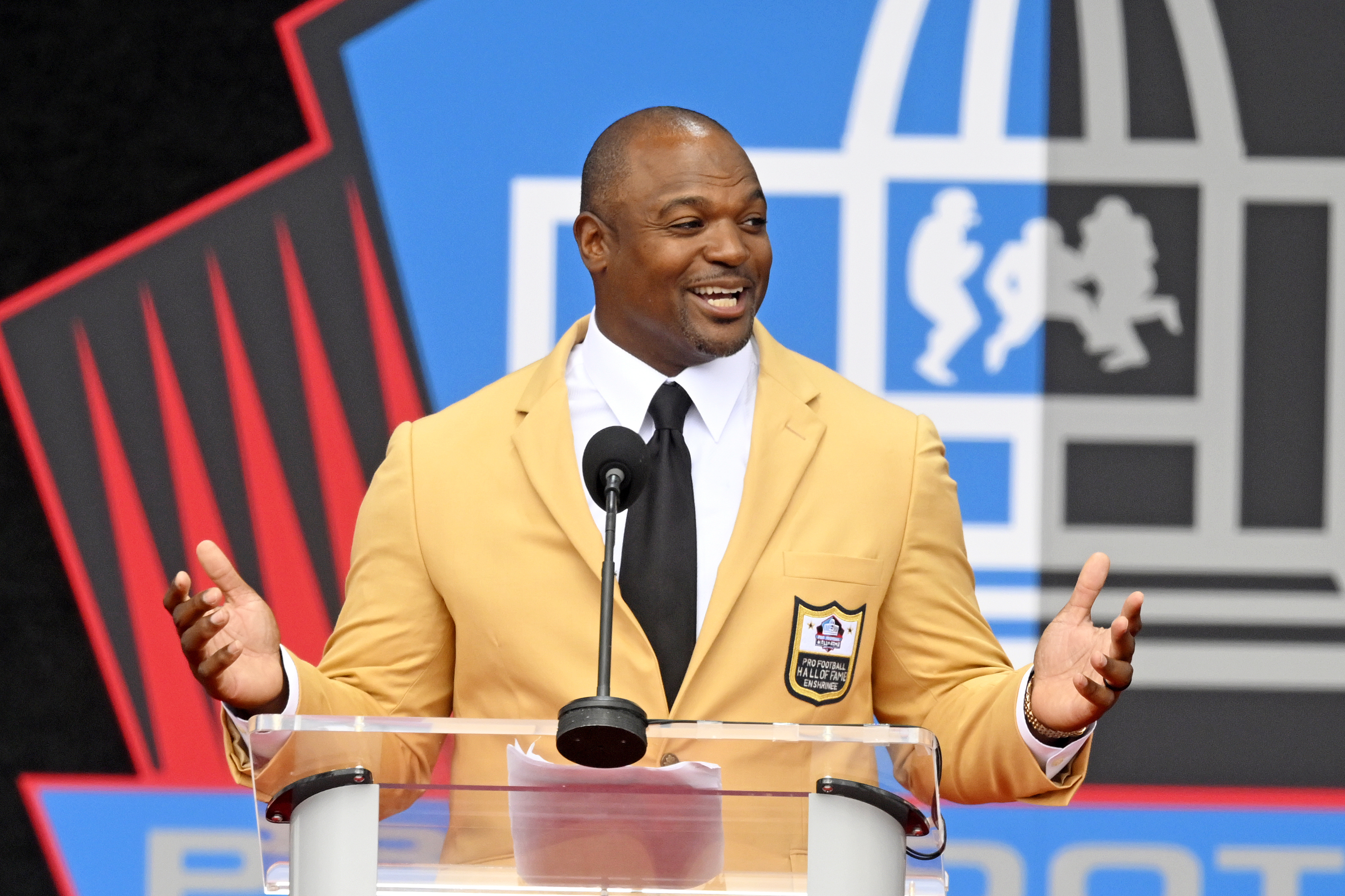 Former NFL player Dwight Freeney speaks during his induction into the Pro Football Hall of Fame, Saturday, Aug. 3, 2024, in Canton, Ohio.