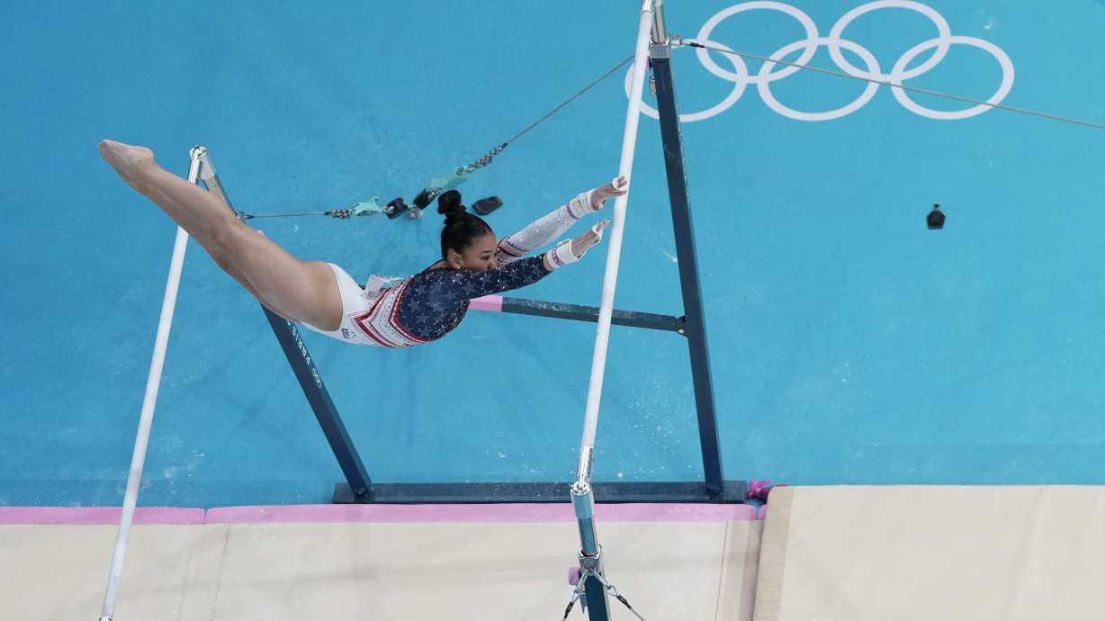 Sunisa Lee, of United States, performs on the uneven bars during the women's artistic gymnastics team finals at the 2024 Summer Olympics, Tuesday, July 30, 2024, in Paris, France.