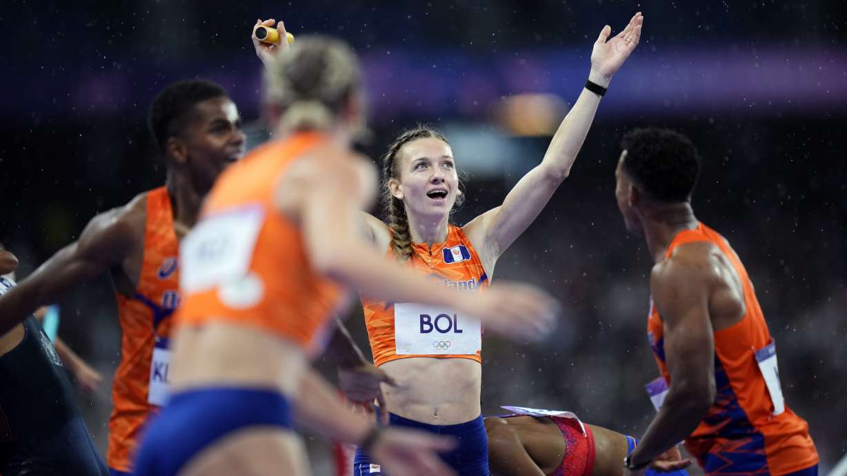 Femke Bol, of the Netherlands, celebrates after anchoring her team to victory in the 4x400-meter relay mixed final at the 2024 Summer Olympics, Saturday, Aug. 3, 2024, in Saint-Denis, France.