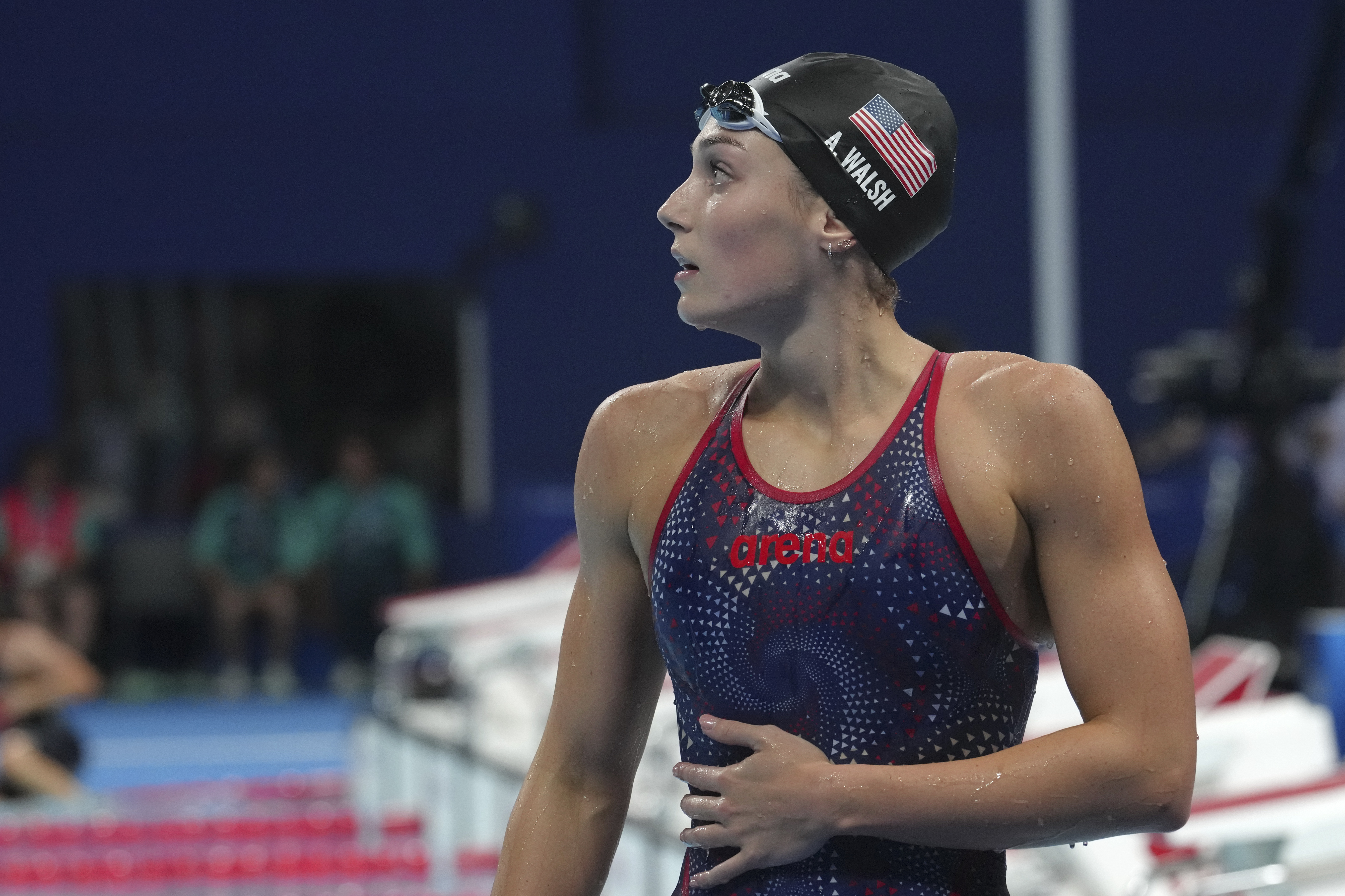 United States' Alex Walsh walks off the pool after the women's 200-meter individual medley final at the Summer Olympics in Nanterre, France, Saturday, Aug. 3, 2024.