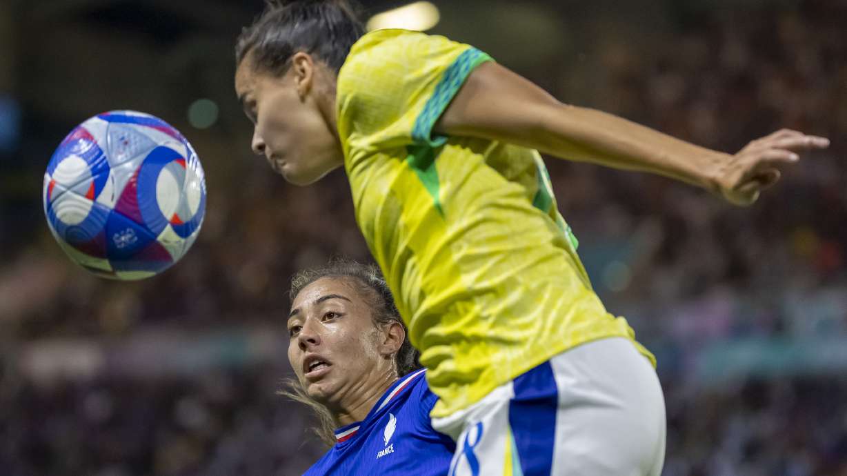Brazil's Gabi Portilho fights for a head ball with France's Selma Bacha during a women's quarterfinal soccer match between France and Brazil at La Beaujoire Stadium, Saturday, Aug. 3, 2024, during the 2024 Summer Olympics in Nantes, France.