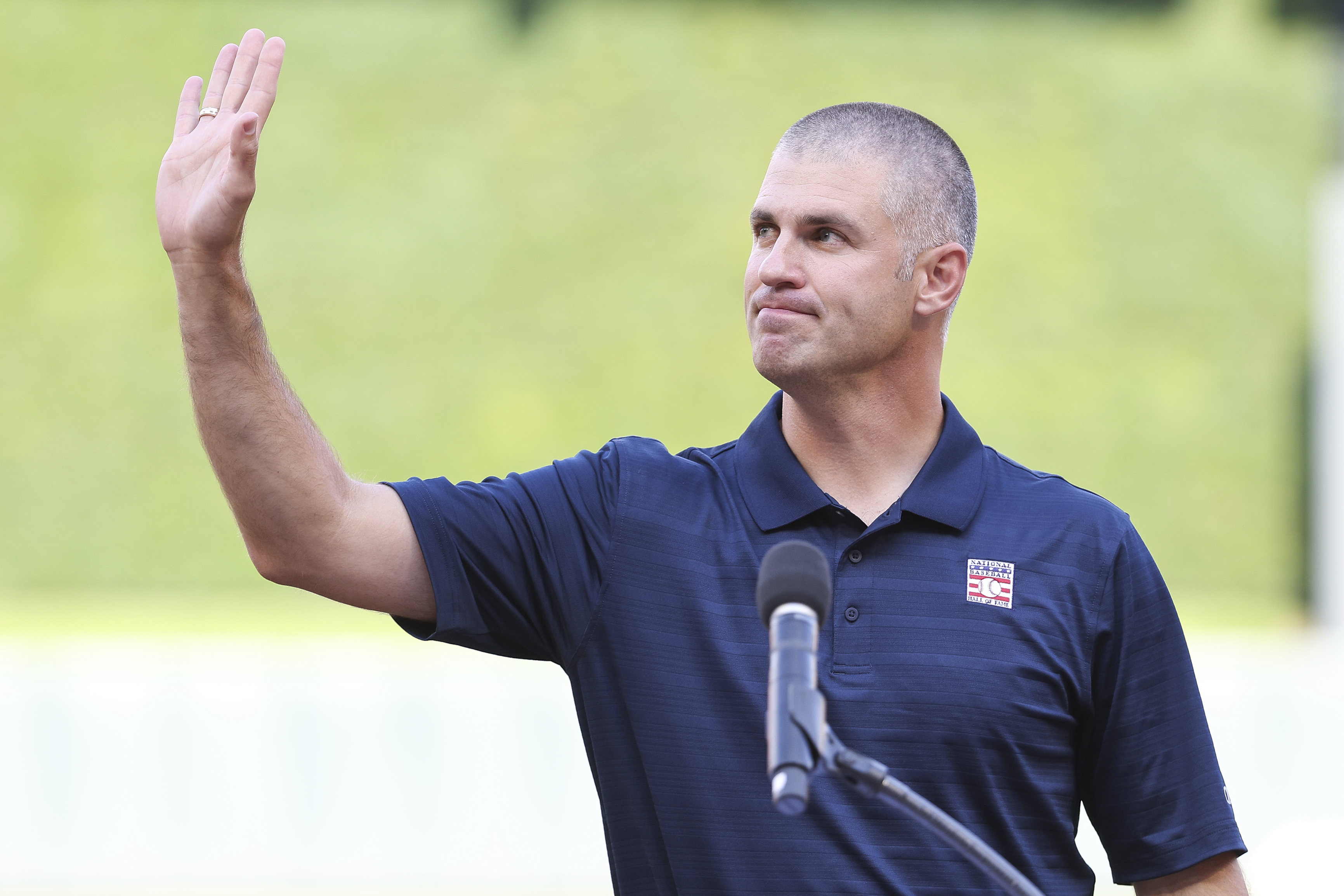 Former Minnesota Twins player Joe Mauer acknowledges the crowd during a ceremony honoring his induction into the National Baseball Hall of Fame before a baseball game between the Chicago White Sox and the Twins, Saturday, Aug. 3, 2024, in Minneapolis. 
