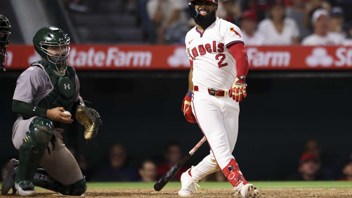 Los Angeles Angels' Luis Rengifo (2) reacts after striking out swinging during the eighth inning of a baseball game against the Oakland Athletics in Anaheim, Calif., Saturday, July 27, 2024.