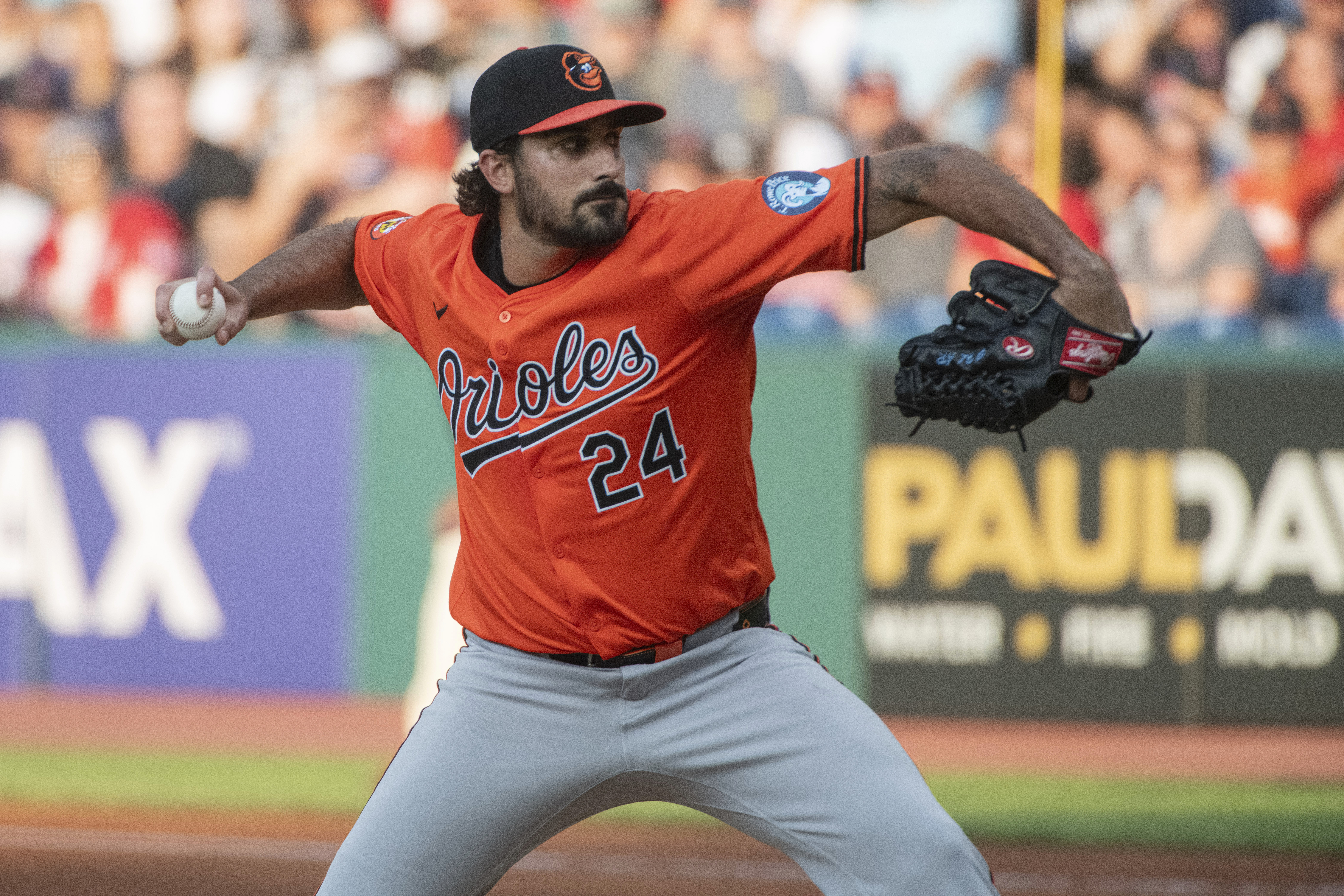 Baltimore Orioles starting pitcher Zach Eflin delivers against the Cleveland Guardians during the first inning of a baseball game in Cleveland, Saturday, Aug. 3, 2024. 