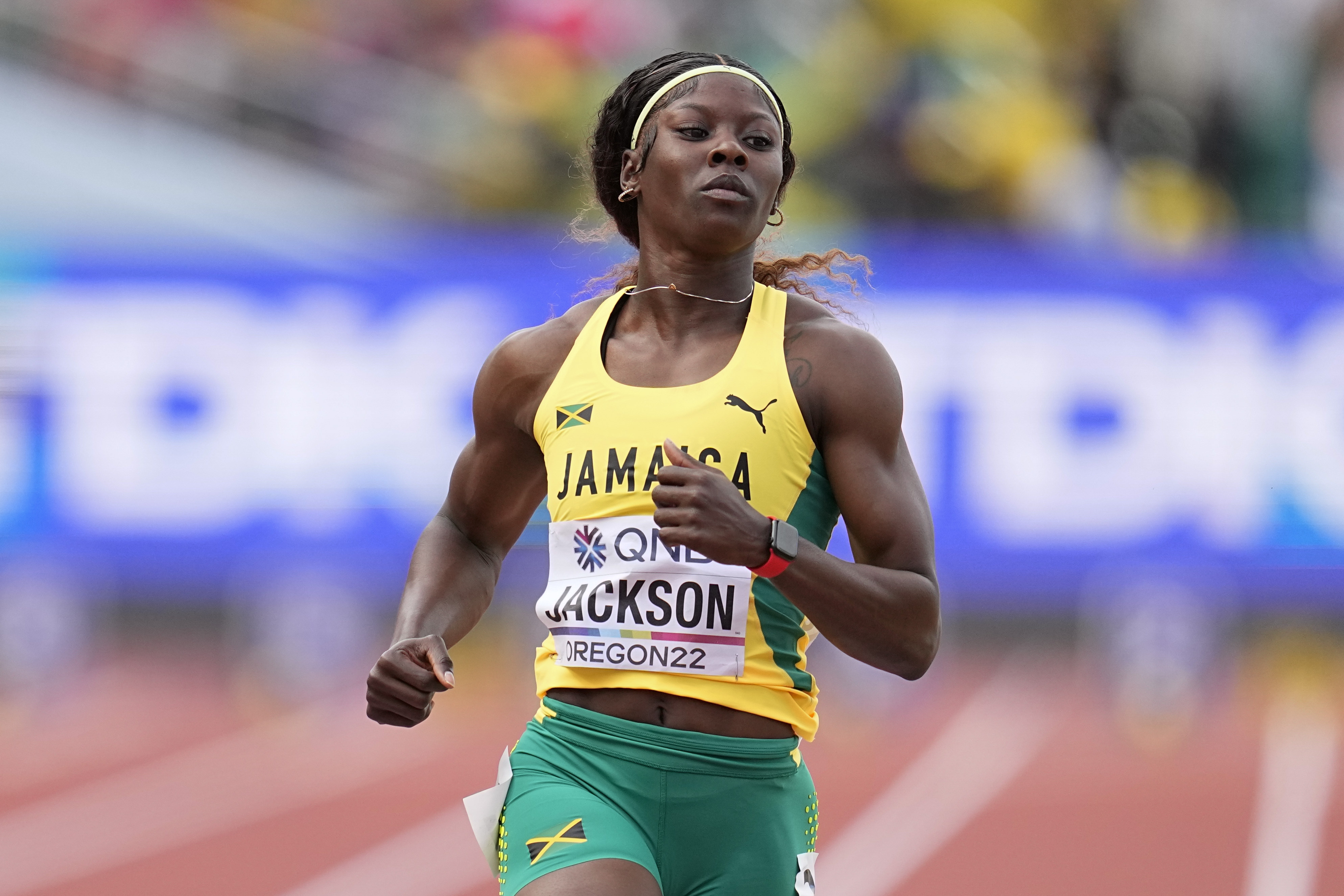 FILE - Shericka Jackson, of Jamaica, wins a heat in the women's 100-meter run at the World Athletics Championships, July 16, 2022, in Eugene, Ore. 