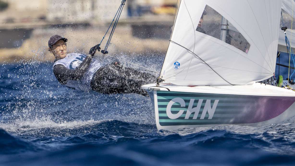 China's Huicong Mai and Linlin Chen compete in a mixed dinghy race, Saturday, Aug. 3, 2024, during the 2024 Summer Olympics in Marseille, France.