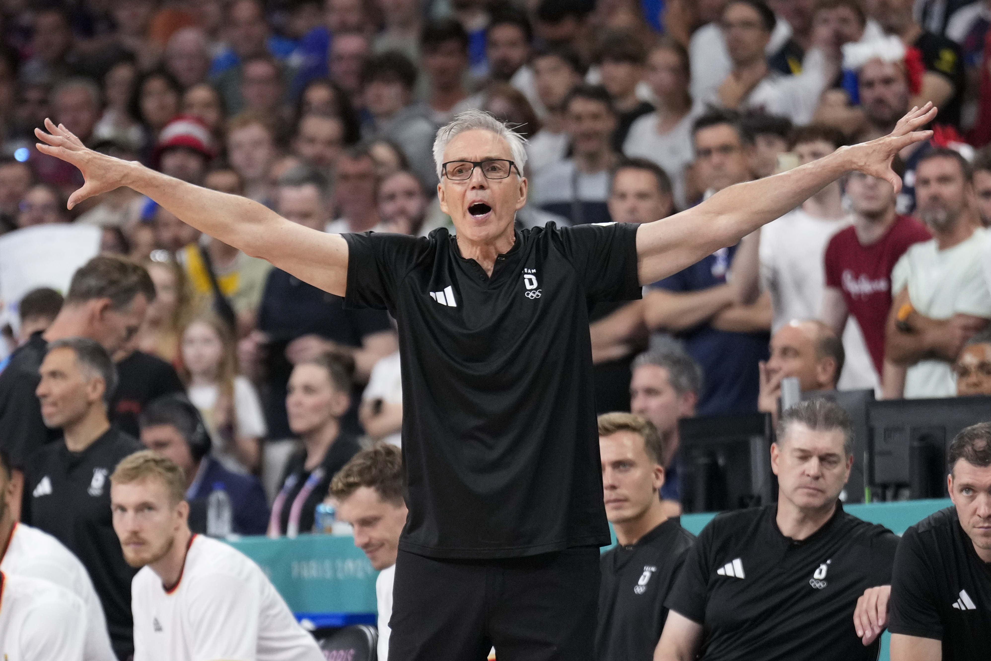 Germany head coach Gordie Herbert gestures in a men's basketball game against France at the 2024 Summer Olympics, Friday, Aug. 2, 2024, in Villeneuve-d'Ascq, France. 
