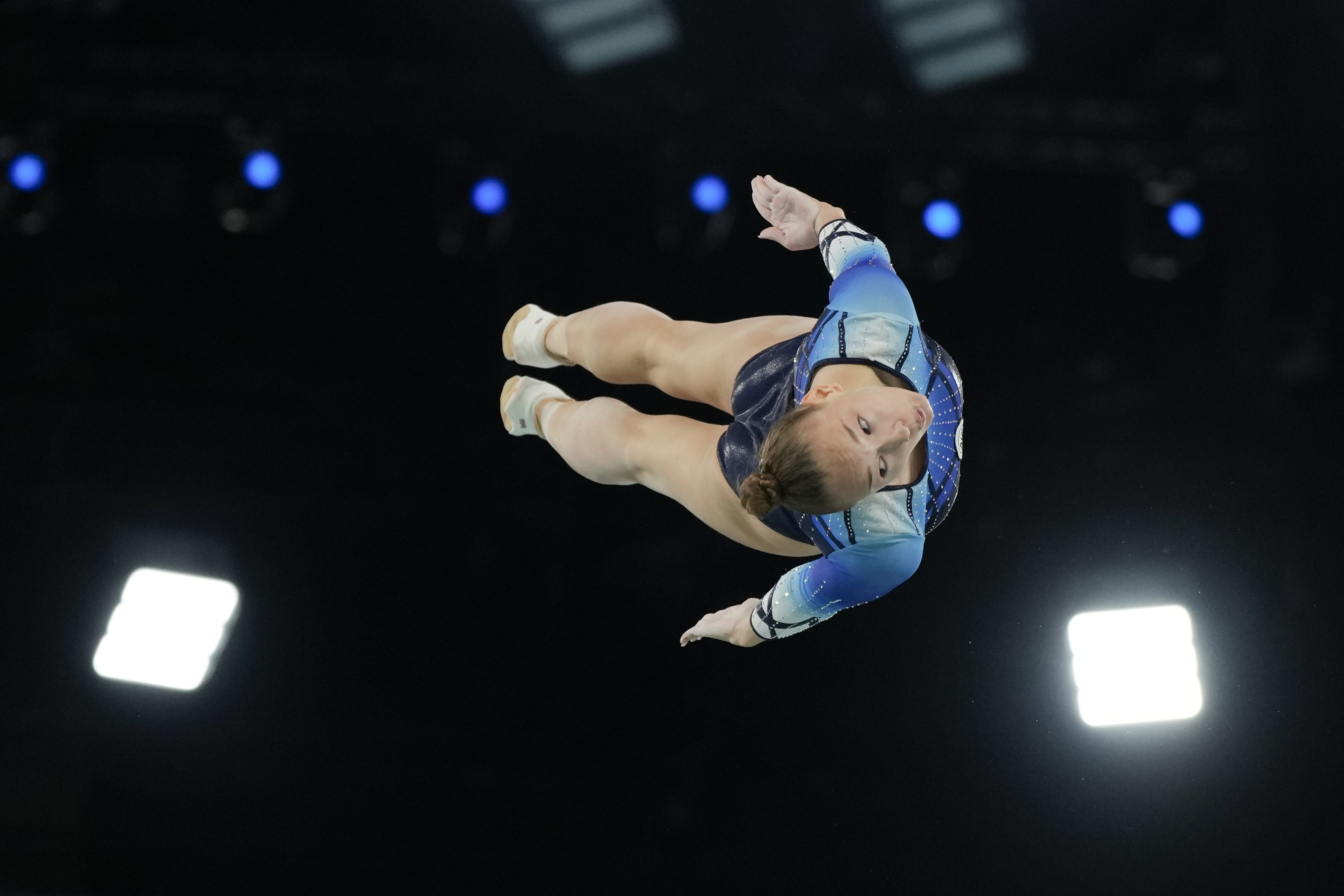 Anzhela Bladtceva of the Individual Neutral Athletes competes during the women's trampoline qualification round in Bercy Arena at the 2024 Summer Olympics, Friday, in Paris, France.