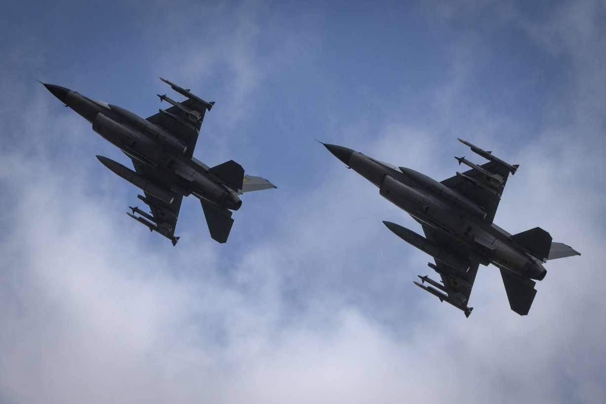 The Ukrainian Air Force's F-16 fighter jets fly in an undisclosed location in Ukraine, Sunday. The F-16 fighter jets that have been delivered to Ukraine by Western countries will be flying sorties in Ukrainian skies and helping the country's current fleet of Soviet-era jets to counter Russia's invasion.