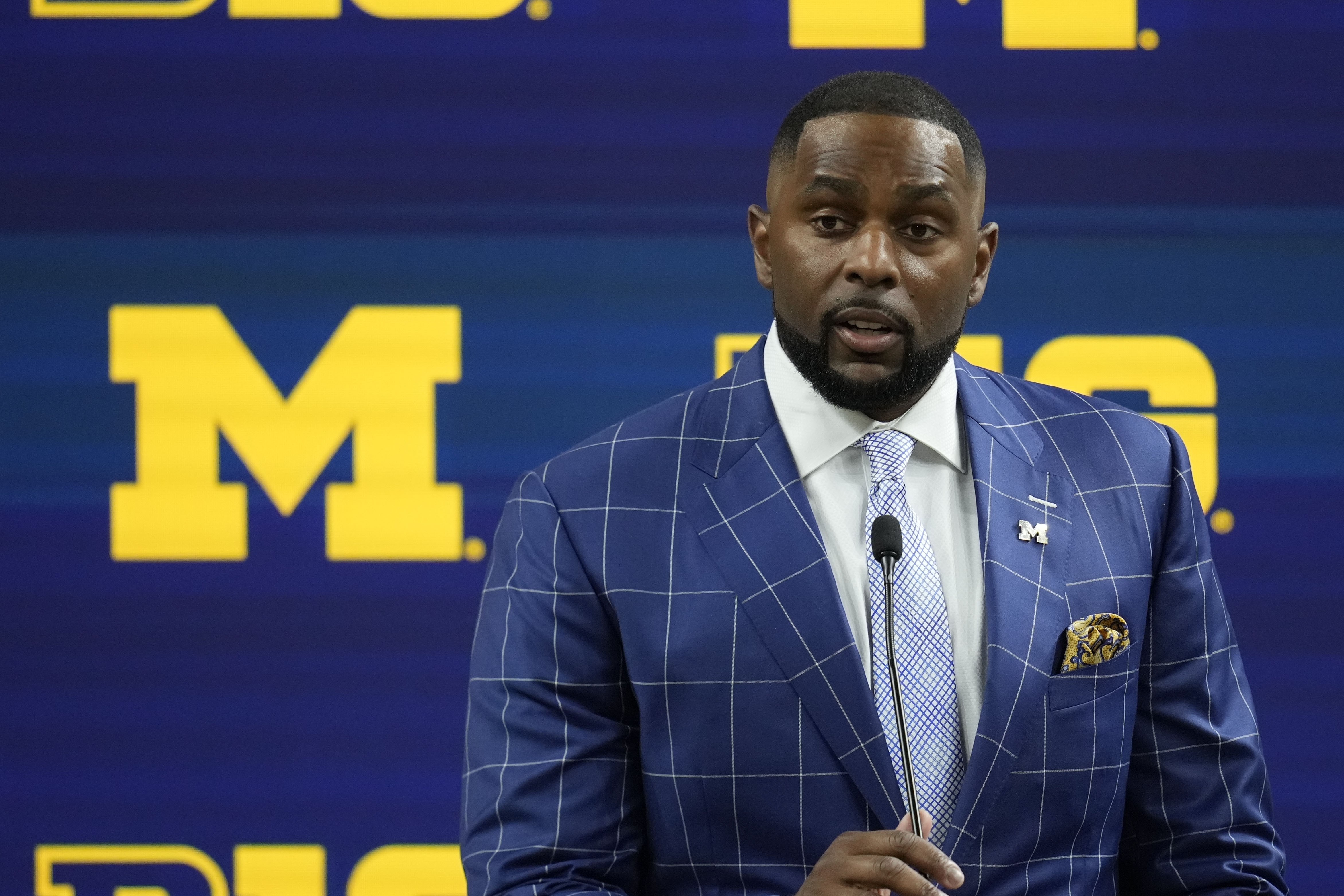 Michigan head coach Sherrone Moore speaks during an NCAA college football news conference at the Big Ten Conference media days at Lucas Oil Stadium, Thursday, July 25, 2024, in Indianapolis. 