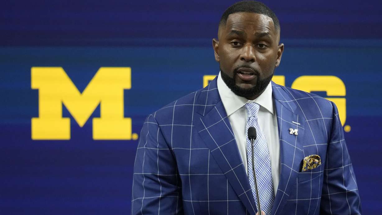 Michigan head coach Sherrone Moore speaks during an NCAA college football news conference at the Big Ten Conference media days at Lucas Oil Stadium, Thursday, July 25, 2024, in Indianapolis.