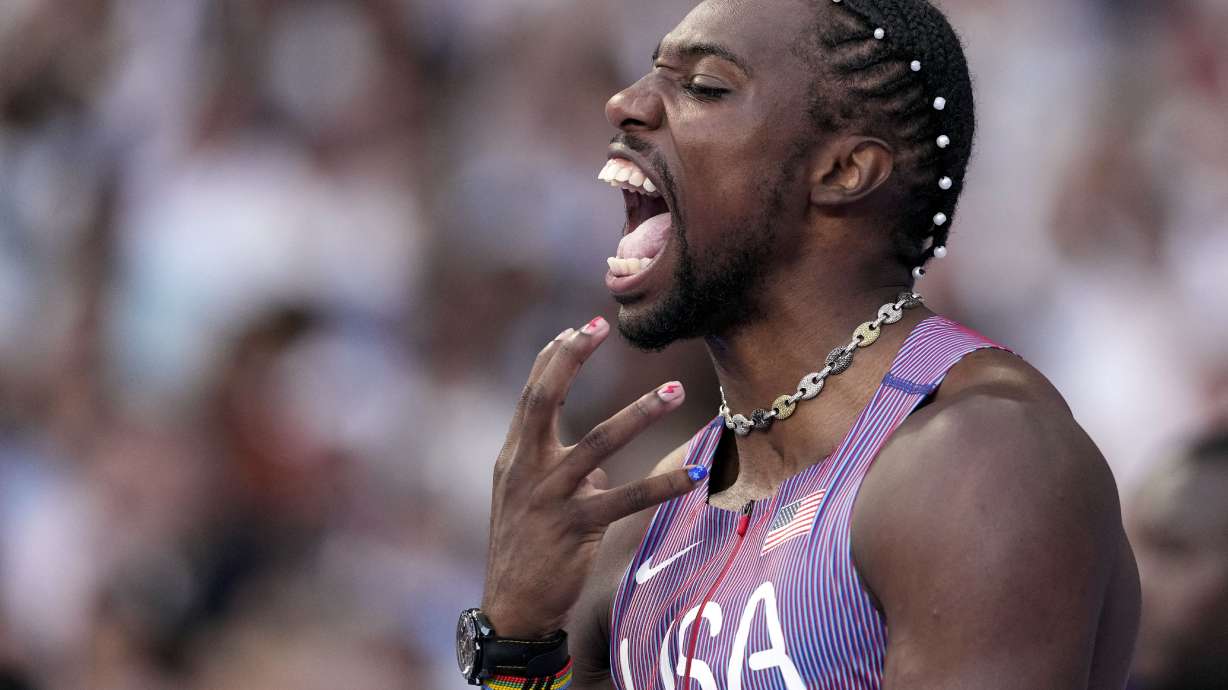 Noah Lyles, of the United States, reacts ahead of his men's 100-meters semifinal at the 2024 Summer Olympics, Sunday, Aug. 4, 2024, in Saint-Denis, France.