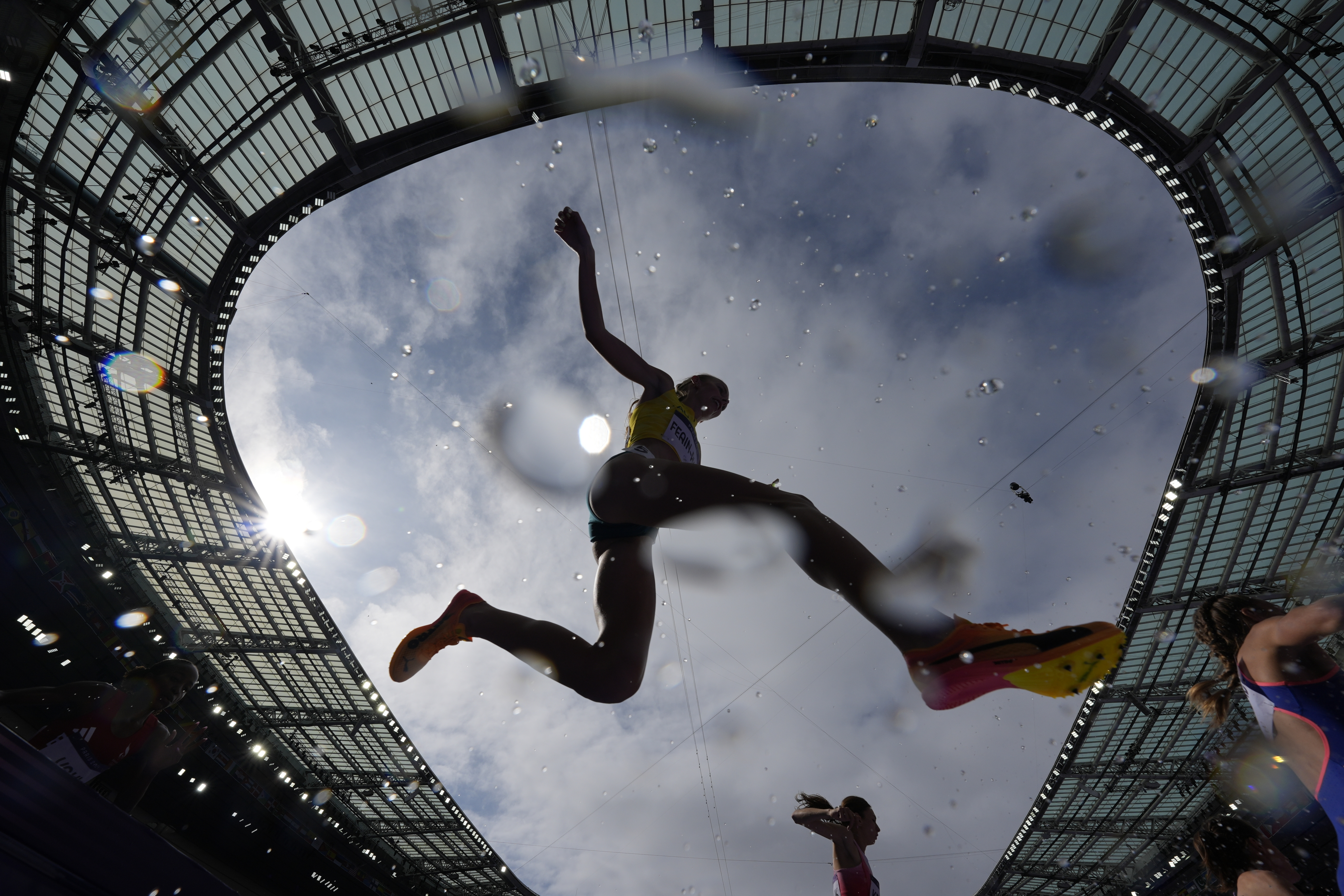 Cara Feain-Ryan, of Australia, competes in a heat of the women's 3000-meter steeplechase at the 2024 Summer Olympics, Sunday, Aug. 4, 2024, in Saint-Denis, France. 