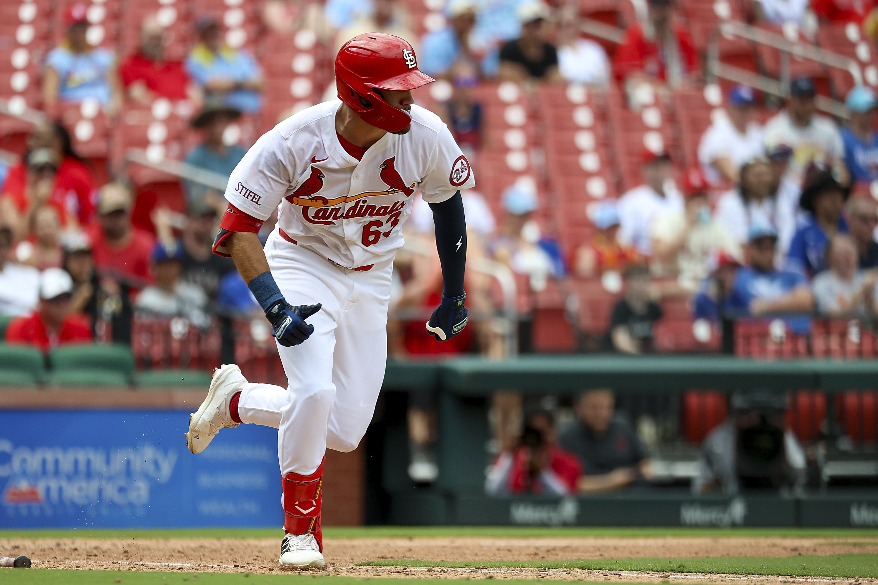 St. Louis Cardinals' Michael Siani runs for an RBI single during the seventh inning of a baseball game against the Texas Rangers, Wednesday, July 31, 2024, in St. Louis.