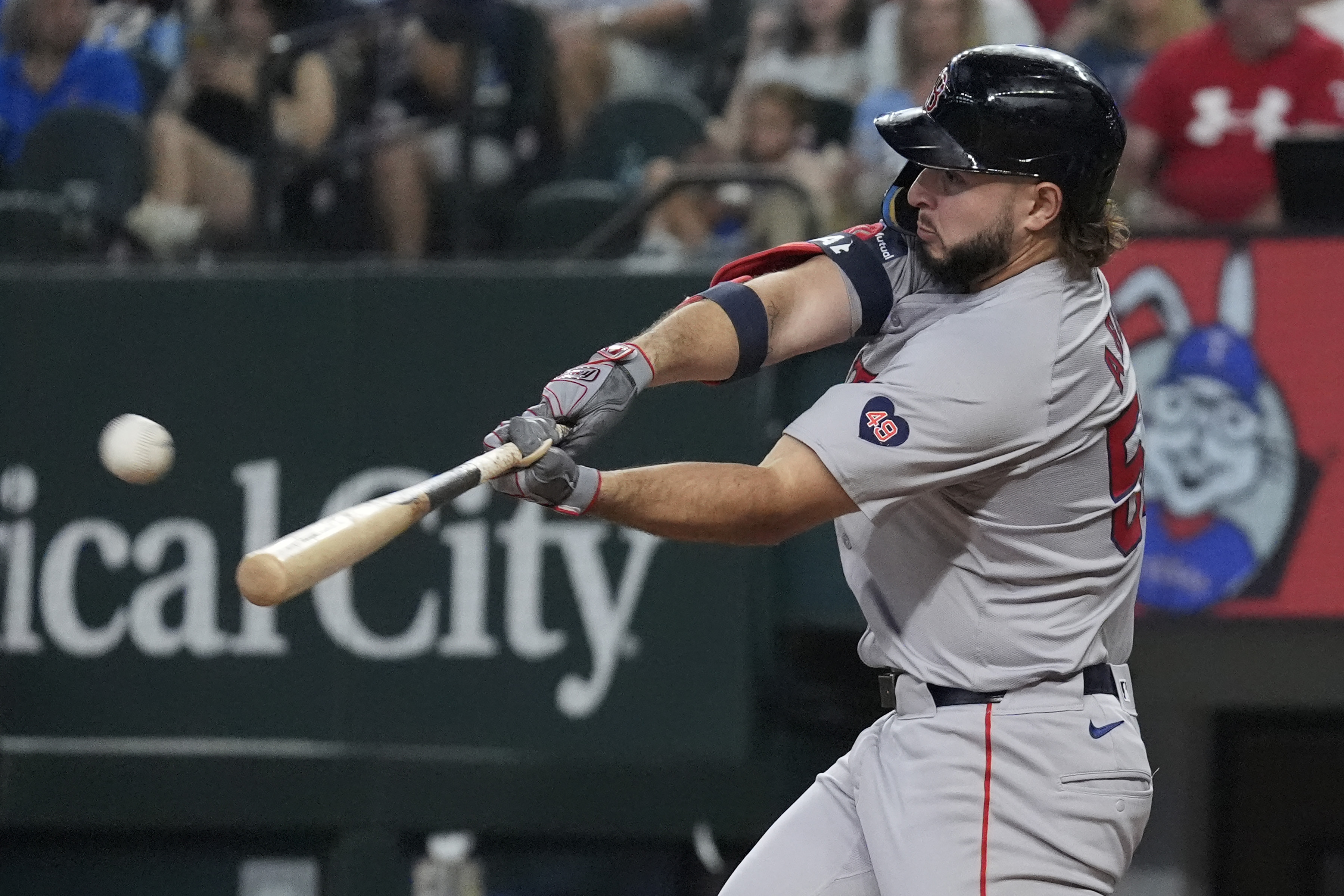 Boston Red Sox's Wilyer Abreu hits a home run during the sixth inning of a baseball game against the Texas Rangers in Arlington, Texas, Sunday, Aug. 4, 2024. 