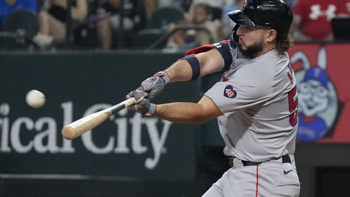 Boston Red Sox's Wilyer Abreu hits a home run during the sixth inning of a baseball game against the Texas Rangers in Arlington, Texas, Sunday, Aug. 4, 2024.