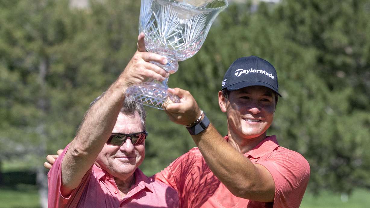 Karl Vilips celebrates with his father Paul Villas after winning the Korn Ferry Tour Utah Championship at Oakridge Country Club in Farmington on Sunday, Aug. 4, 2024.