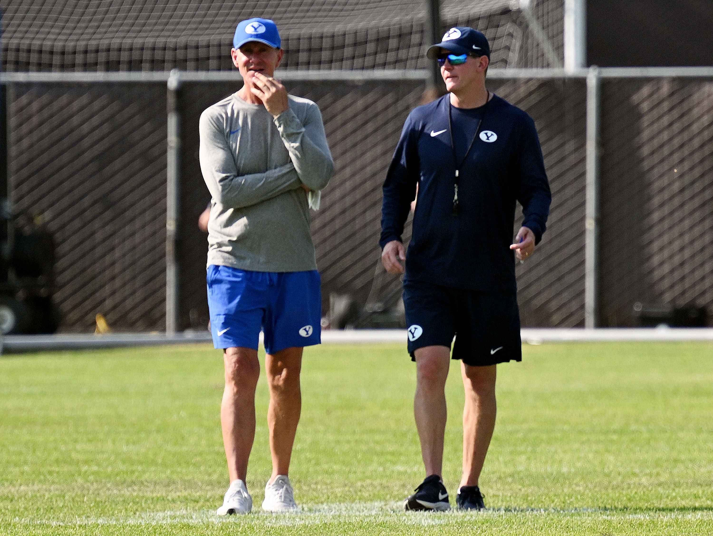 BYU coaches Gary Andersen, left, and Jay Hill hold their first fall football practice in Provo on Wednesday, July 31, 2024.