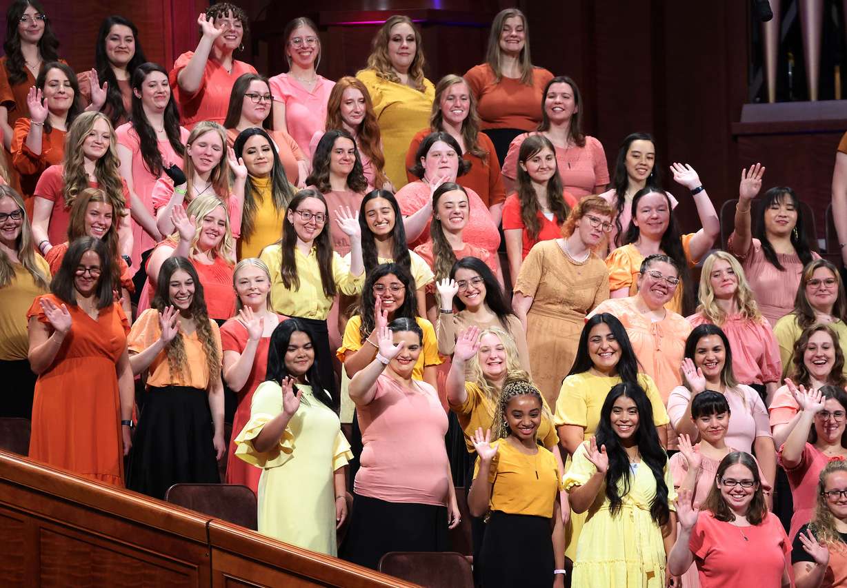 YSA choir members wave to Elder Dieter F. Uchtdorf prior to the YSA Conference devotional at the Conference Center in Salt Lake City on Sunday.