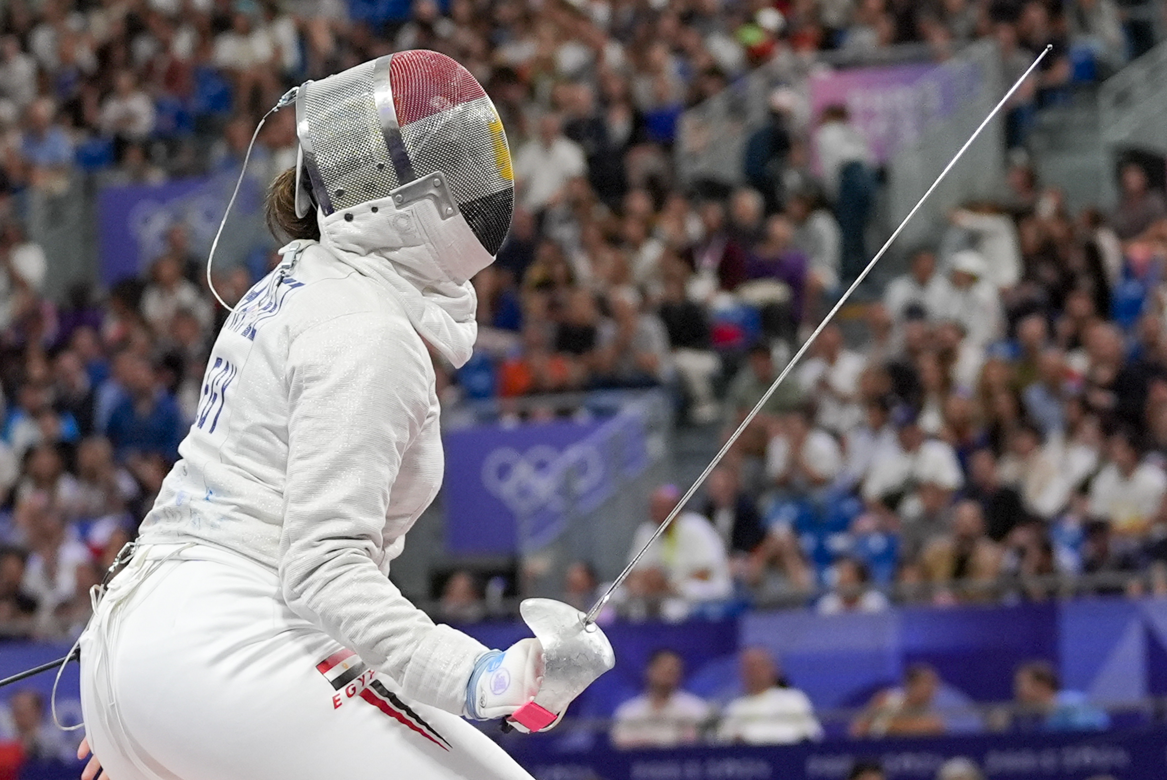 Egypt's Nada Hafez competes with United States' Elizabeth Tartakovsky in the women's individual Sabre round of 32 competition during the 2024 Summer Olympics at the Grand Palais, Monday, July 29, 2024, in Paris, France. 