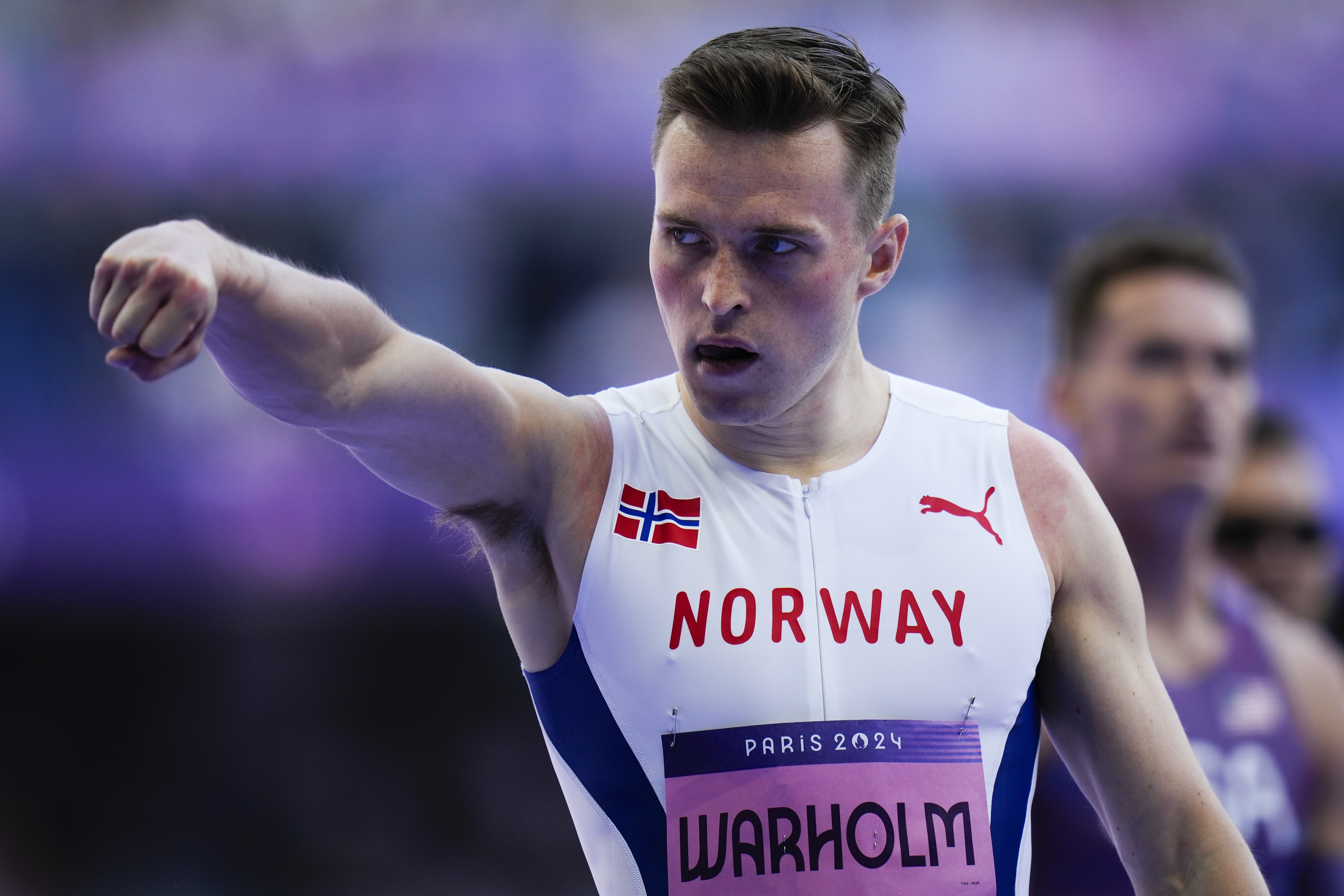 Karsten Warholm, of Norway, reacts after his men's 400-meter hurdles heat at the 2024 Summer Olympics, Monday, Aug. 5, 2024, in Saint-Denis, France. 