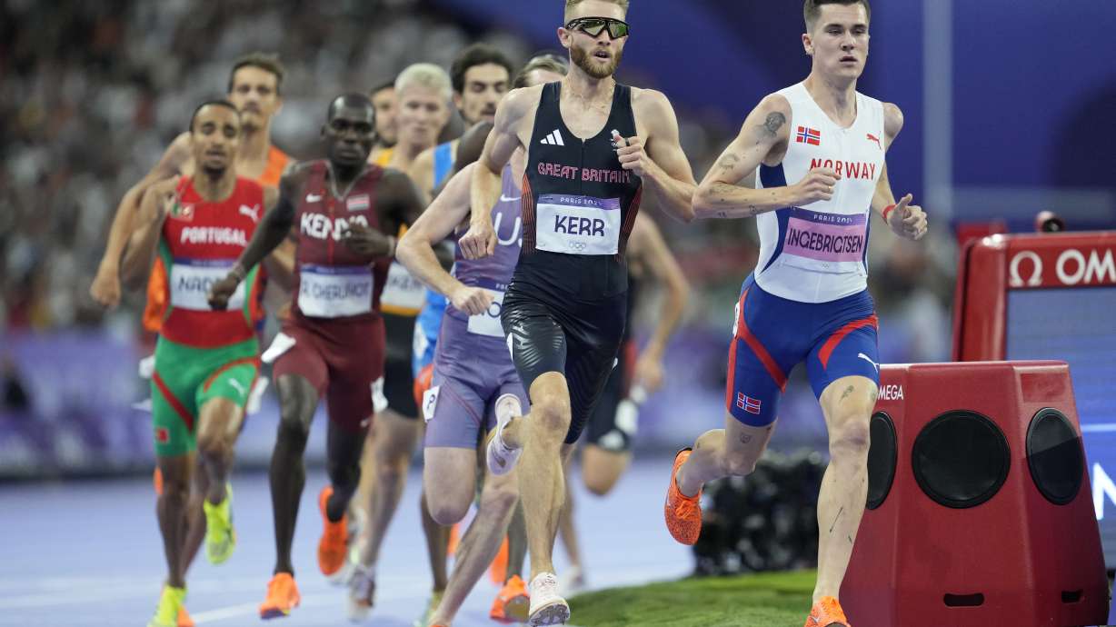 Jakob Ingebrigtsen, of Norway, and Josh Kerr, of Britain, run in a men's 1500 meters semifinal at the 2024 Summer Olympics, Sunday, Aug. 4, 2024, in Saint-Denis, France.