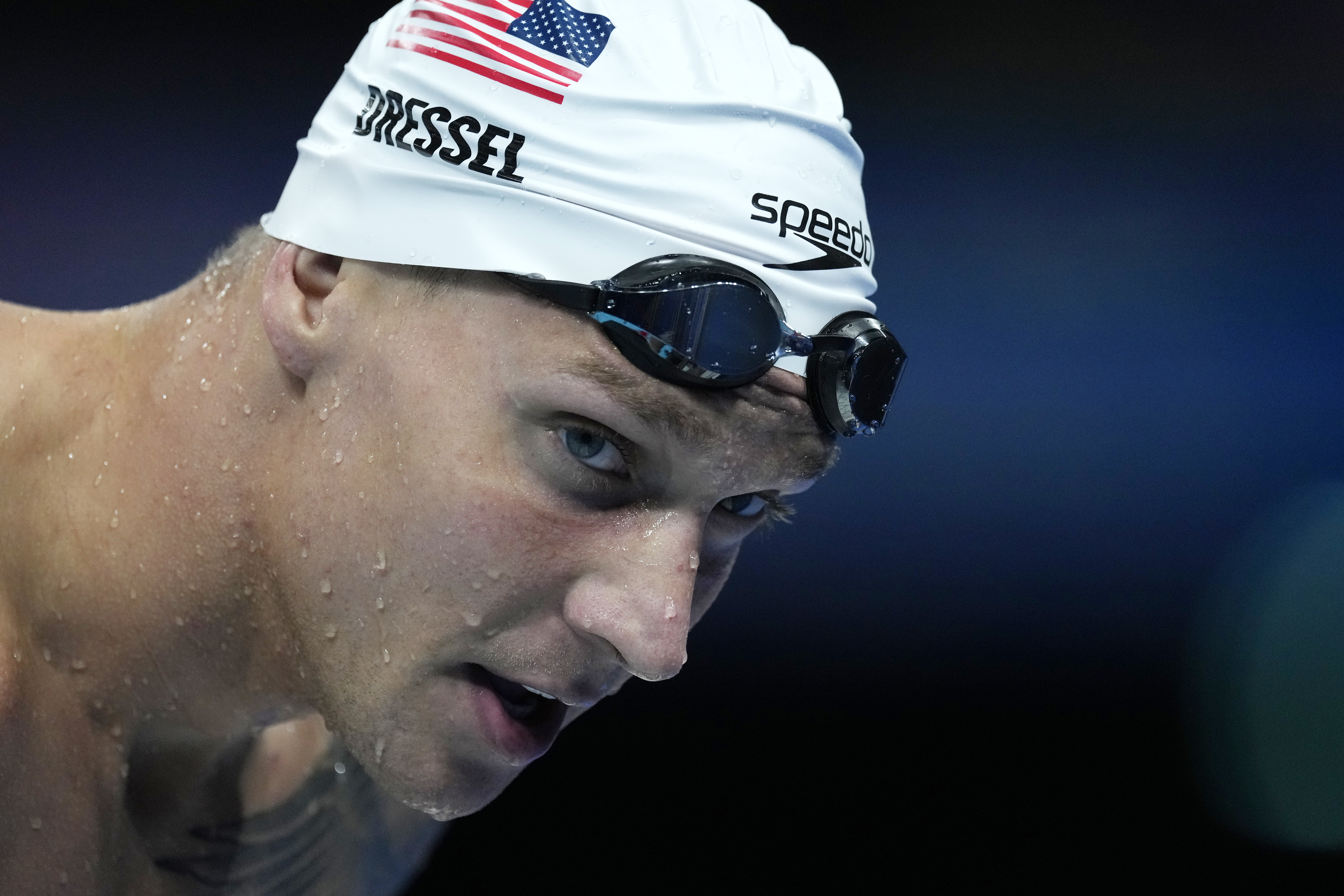 Caeleb Dressel of United States, warms up ahead of the men's 50-meter freestyle final at the 2024 Summer Olympics, Friday, Aug. 2, 2024, in Nanterre, France. 