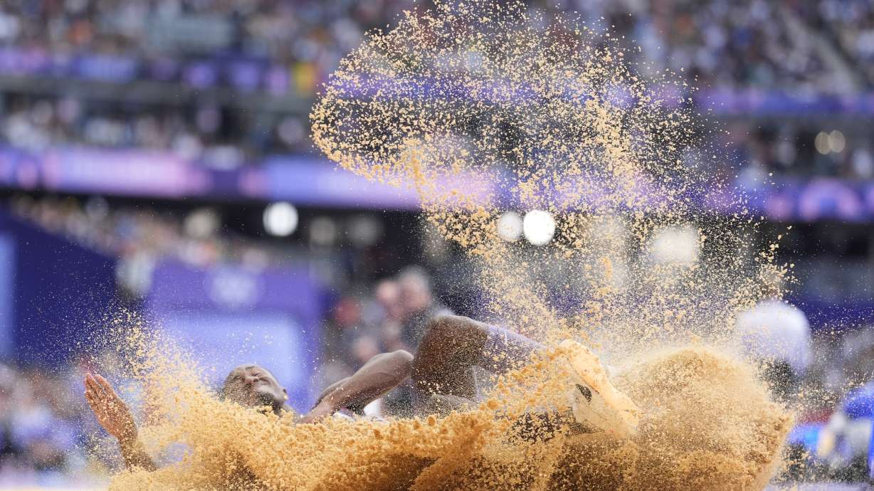 Malcolm Clemons, of the United States, competes in the men's long jump qualification at the 2024 Summer Olympics, Sunday, Aug. 4, 2024, in Saint-Denis, France.