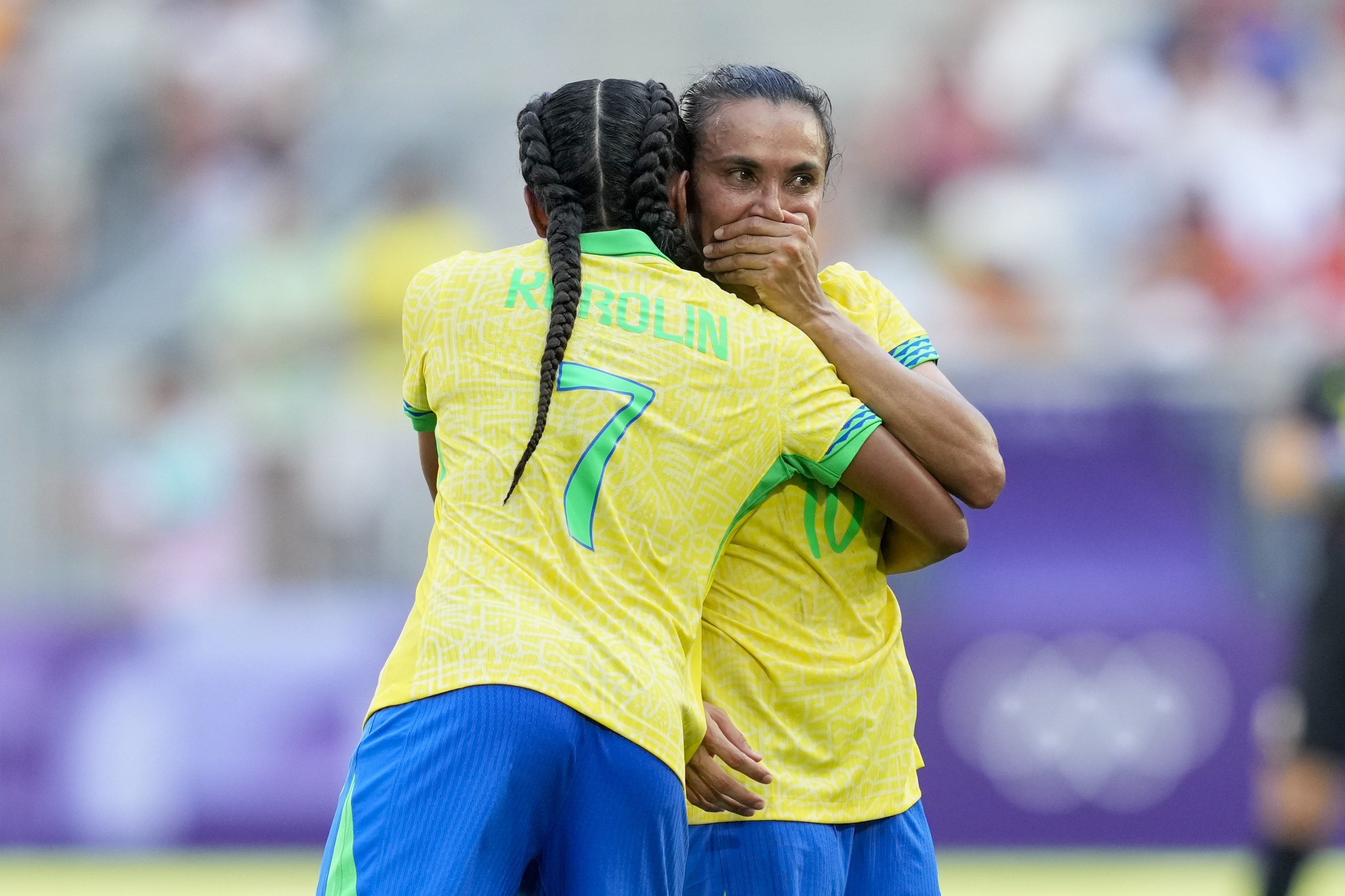 Brazil's Marta, left, talks with Kerolin after being shown a red card during a women's Group C soccer match between Brazil and Spain, at Bordeaux Stadium, during the 2024 Summer Olympics, Wednesday, July 31, 2024, in Bordeaux, France. 
