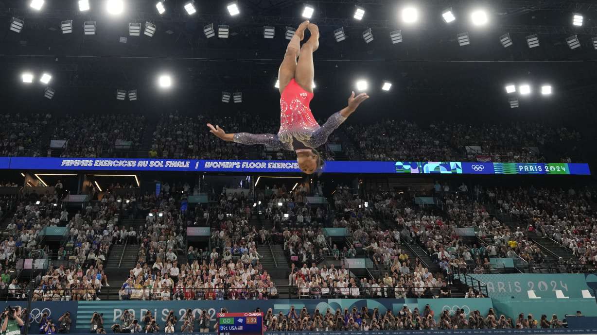Simone Biles, of the United States, competes during the women's artistic gymnastics individual floor finals at Bercy Arena at the 2024 Summer Olympics, Monday, Aug. 5, 2024, in Paris, France.