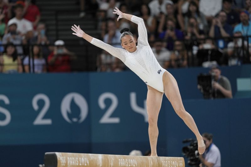Suni Lee, of the United States, bobbles and falls during the women's artistic gymnastics individual balance beam finals at Bercy Arena at the 2024 Summer Olympics, Monday in Paris, France.